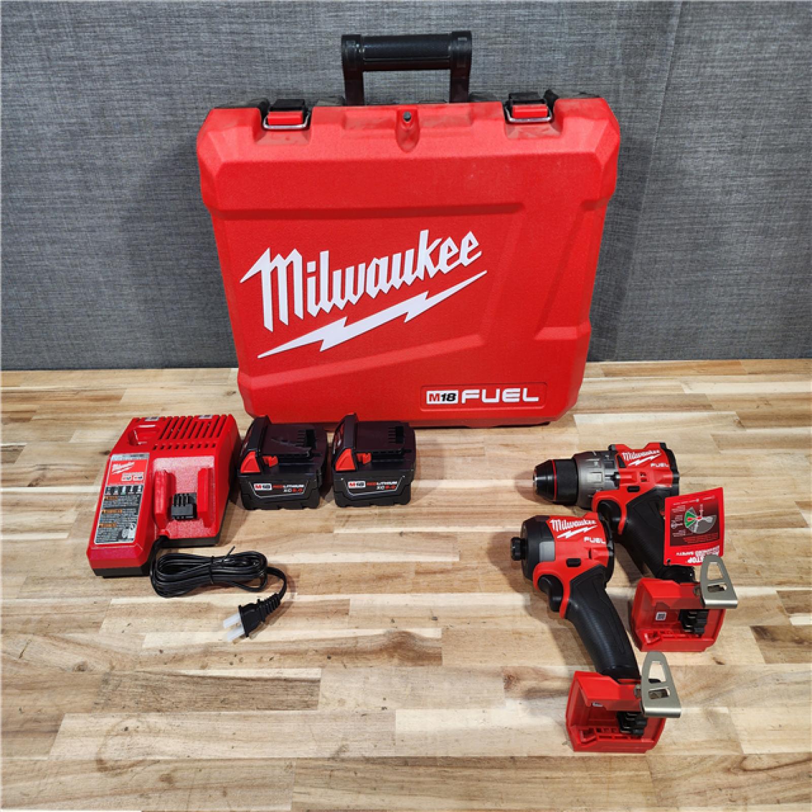 HOUSTON LOCATION - AS-IS Milwaukee  FUEL 18V Lithium-Ion Brushless Cordless Hammer Drill and Impact Driver Combo Kit
