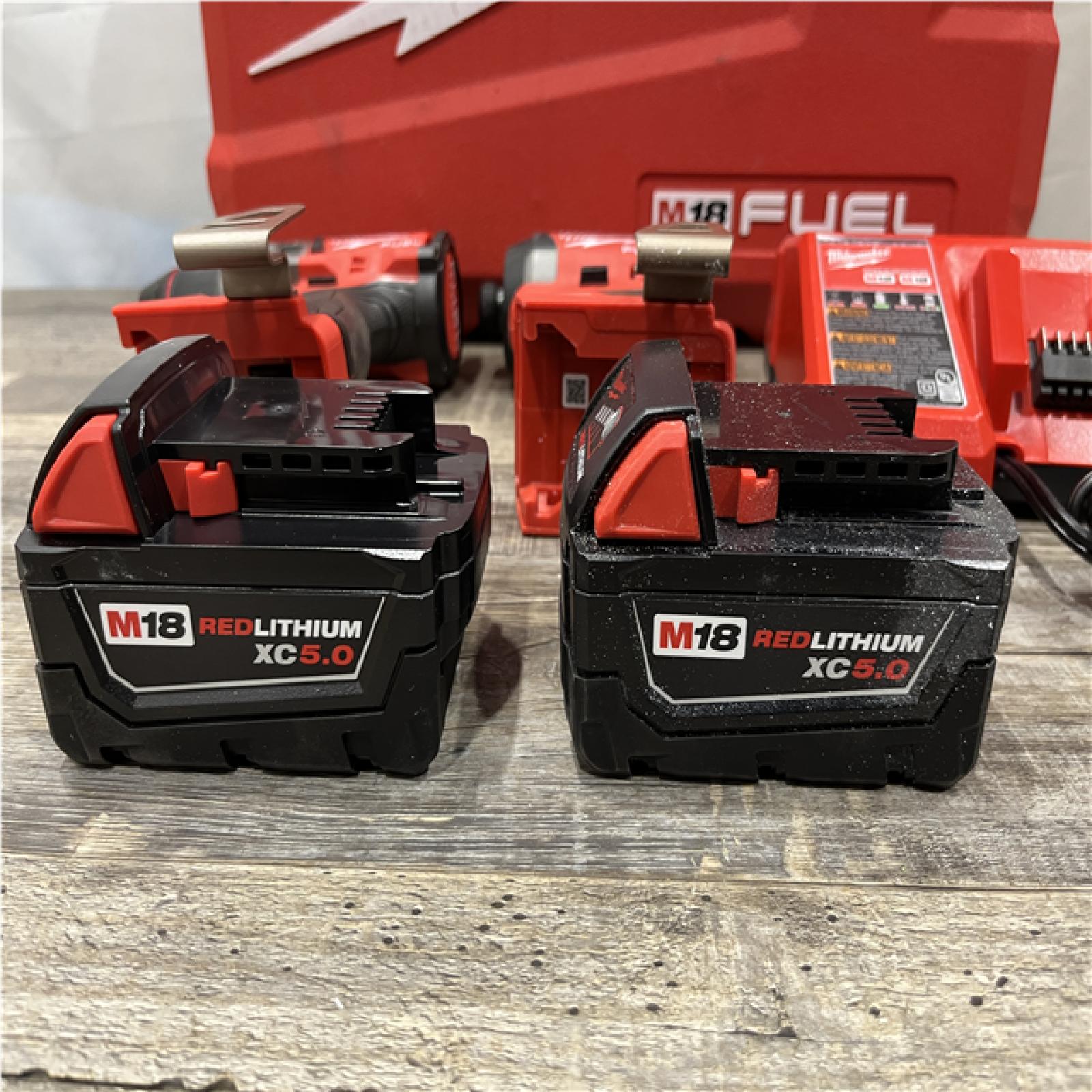 AS-IS Milwaukee FUEL 18V Lithium-Ion Brushless Cordless Hammer Drill and Impact Driver Combo Kit