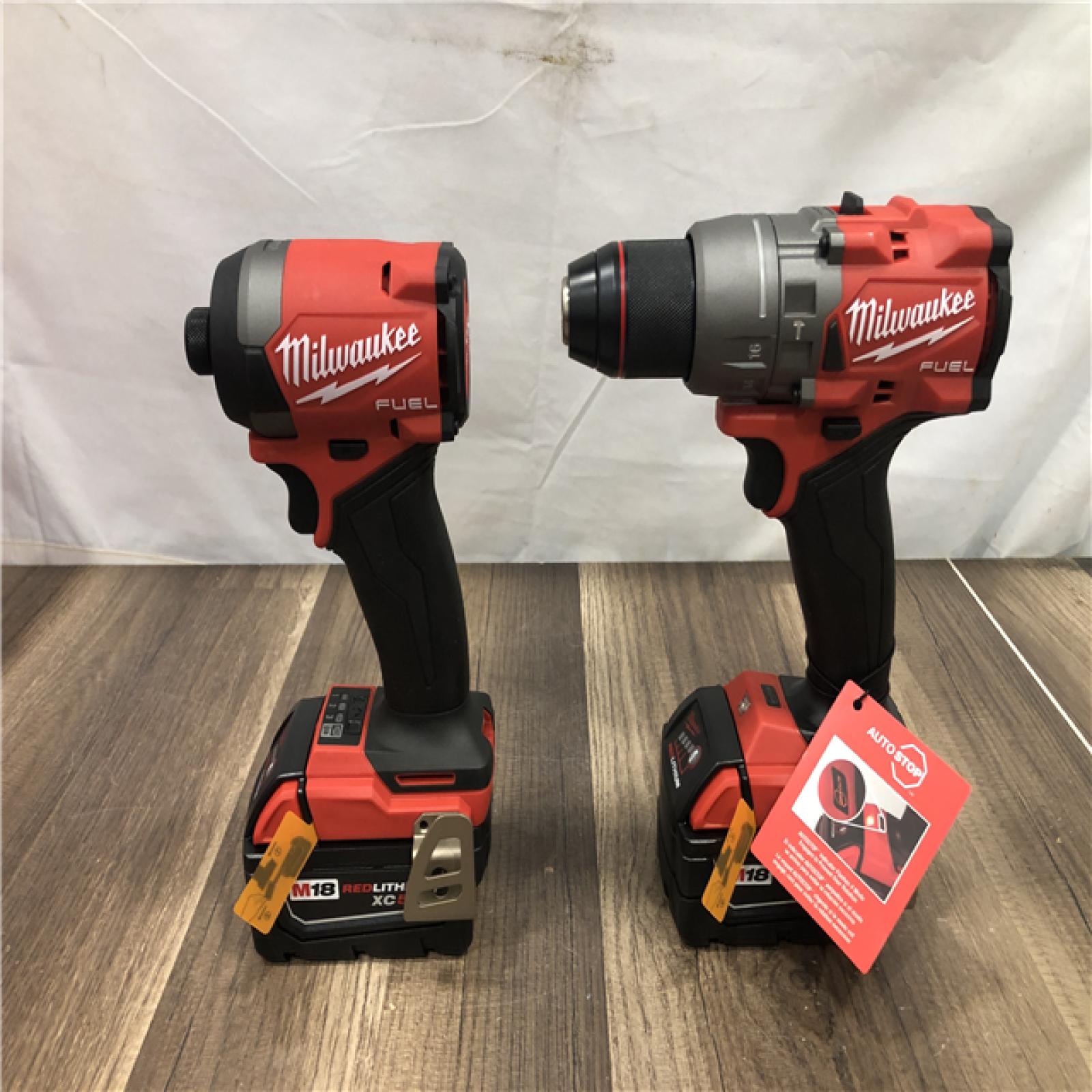 AS-IS Milwaukee FUEL 18V Lithium-Ion Brushless Cordless Hammer Drill and Impact Driver Combo Kit