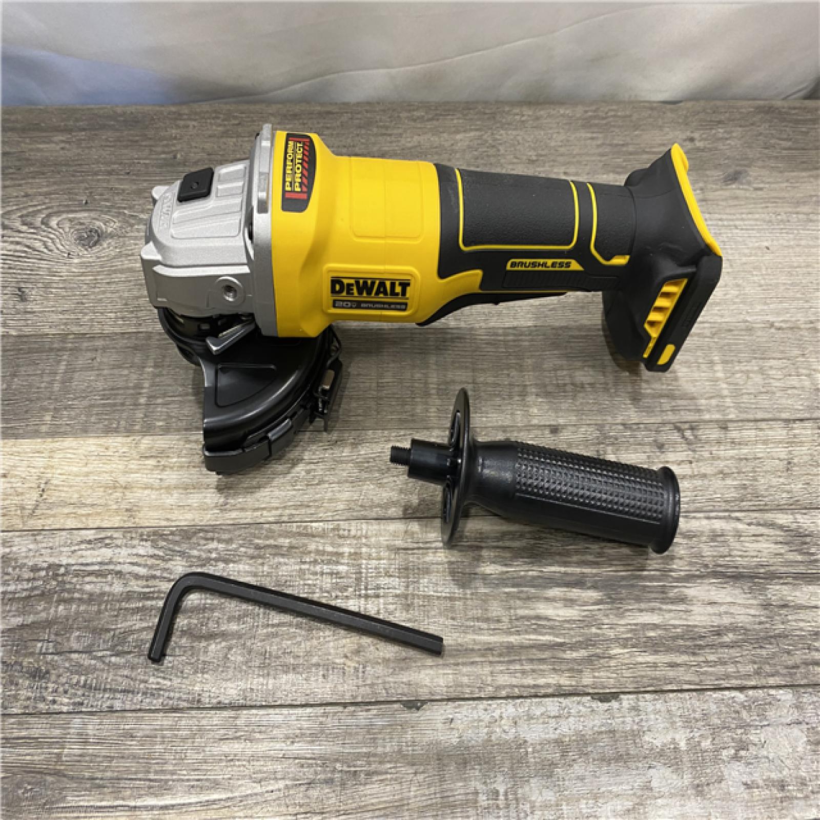 AS-IS DEWALT 20V MAX Cordless Brushless 4-1/2 in. Angle Grinder with Paddle Switch (Tool Only)