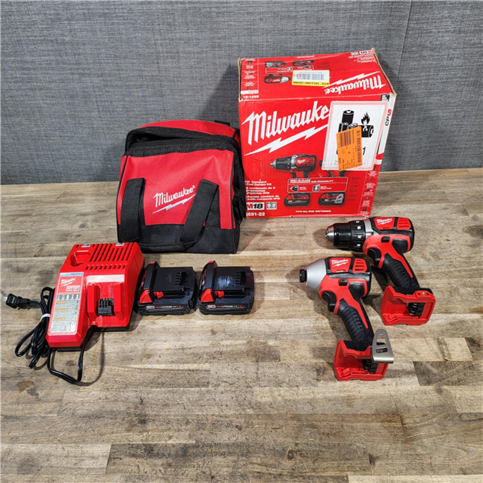 HOUSTON LOCATION - AS-IS Milwaukee 18V Cordless Brushed 2-Tool Drill/Driver and Impact Driver Kit