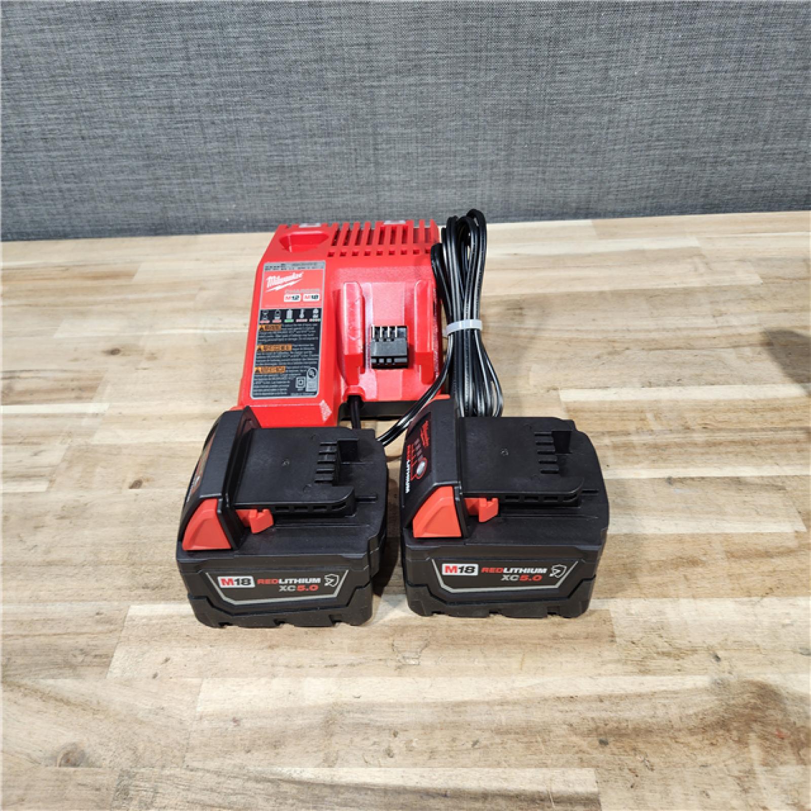 HOUSTON LOCATION - AS-IS MILWAUKEE 2 TOOL COMBO KIT W/ (2) BATTERY & CHARGER