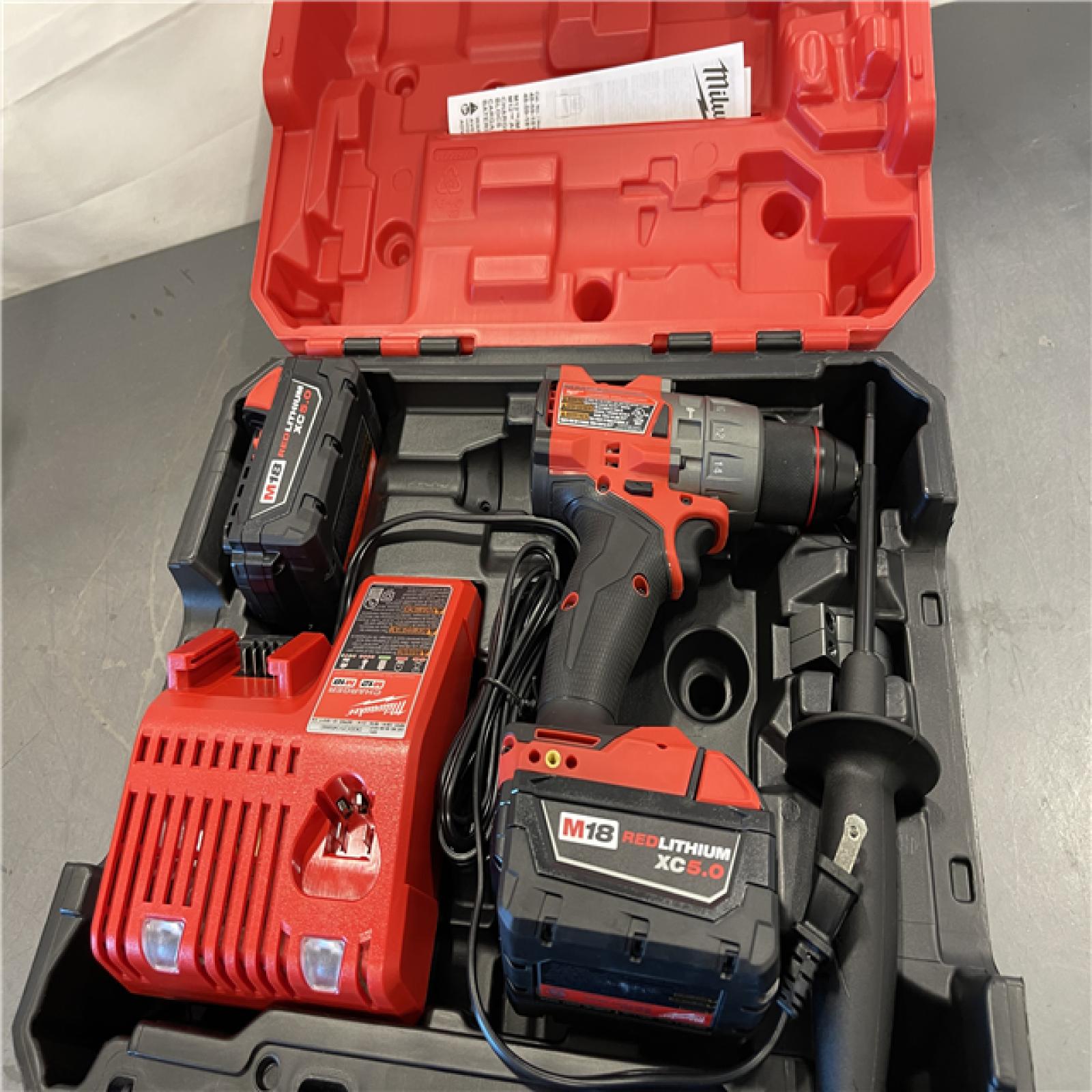 AS-IS - Milwaukee M18 FUEL 18V Lithium-Ion Brushless Cordless 1/2 in. Hammer Drill Driver Kit