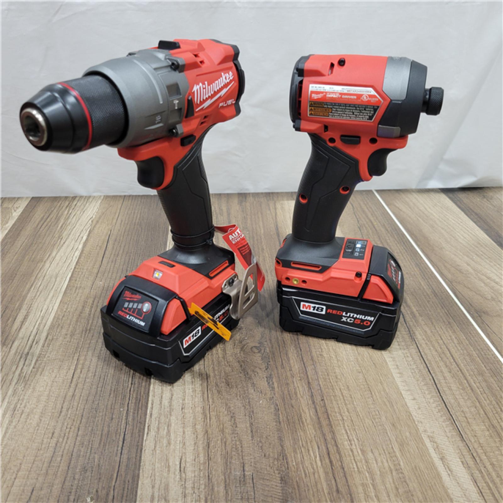 AS-IS Milwaukee M18 FUEL 18V Lithium-Ion Brushless Cordless Hammer Drill and Impact Driver Combo Kit (2-Tool) with 2 Batteries