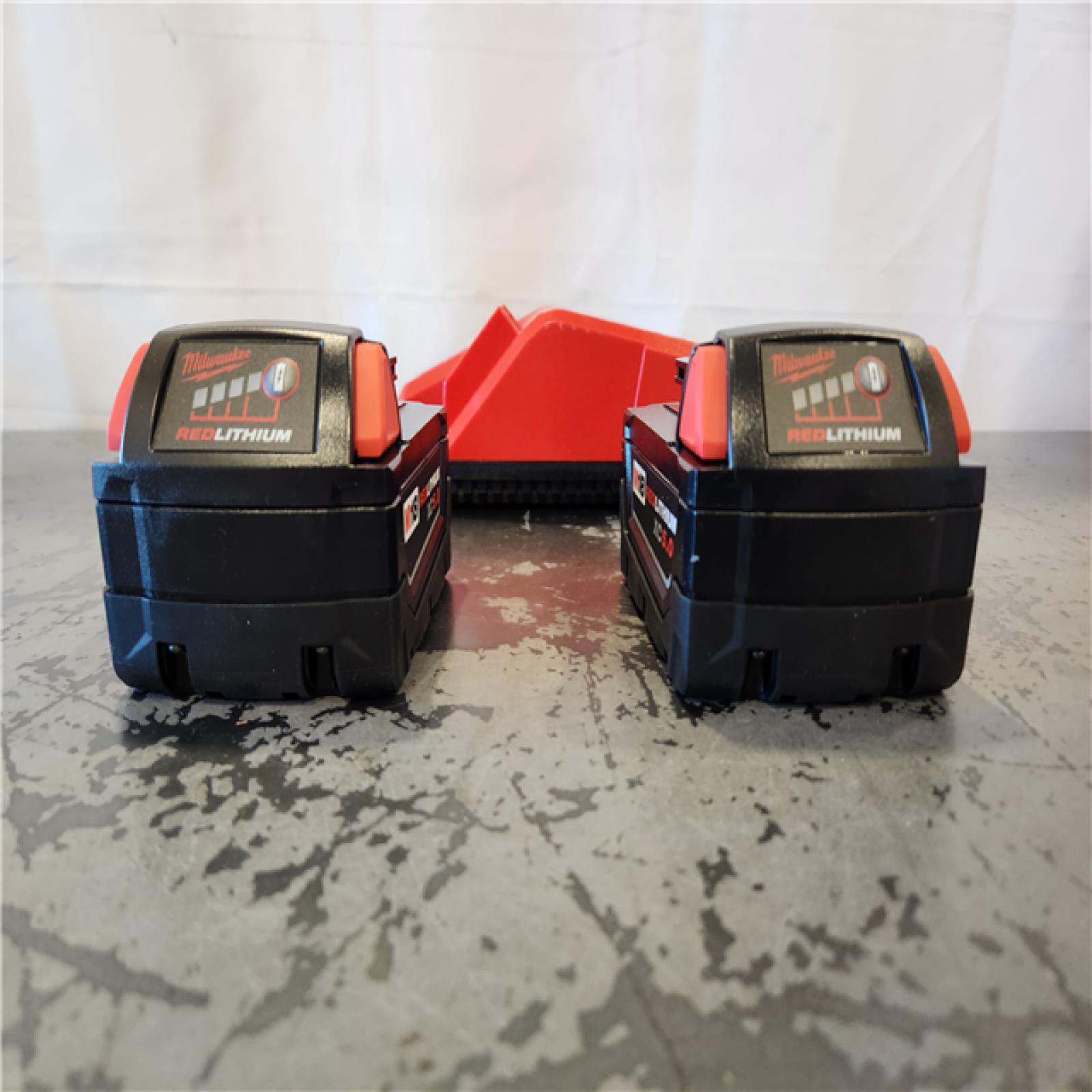 AS-IS- Milwaukee 18-Volt Lithium-Ion XC Starter Kit with Two 5.0Ah Batteries and Charger