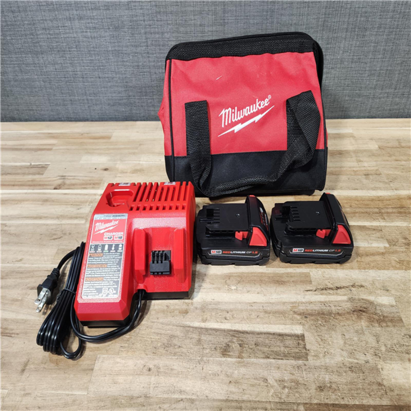 HOUSTON LOCATION - AS-IS Milwaukee 18V Lithium-Ion Cordless Drill Driver/Impact Driver Combo Kit