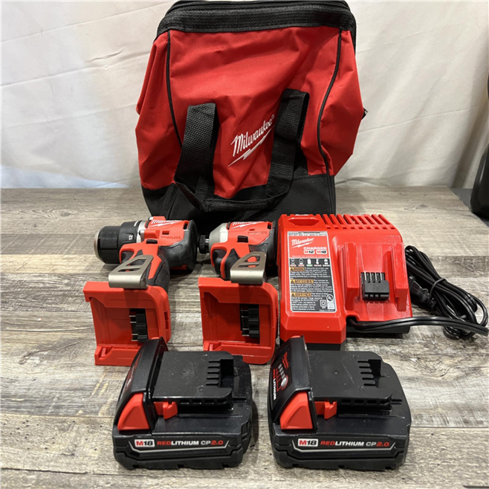 AS-IS Milwaukee 18V Lithium-Ion Brushless Cordless Compact Drill/Impact Combo Kit