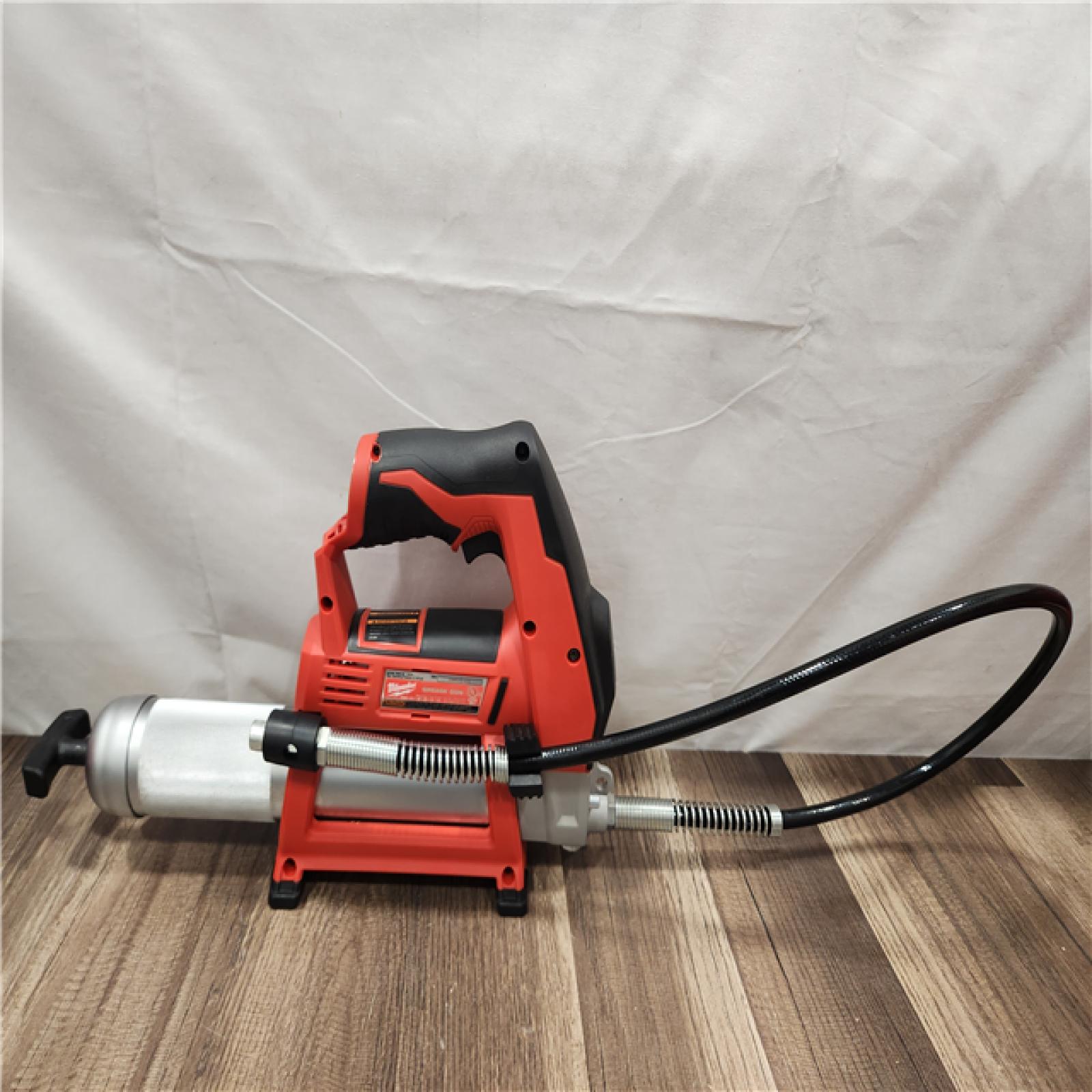 AS-IS- Milwaukee M12 Cordless LITHIUM-ION Grease Gun (Tool-Only)