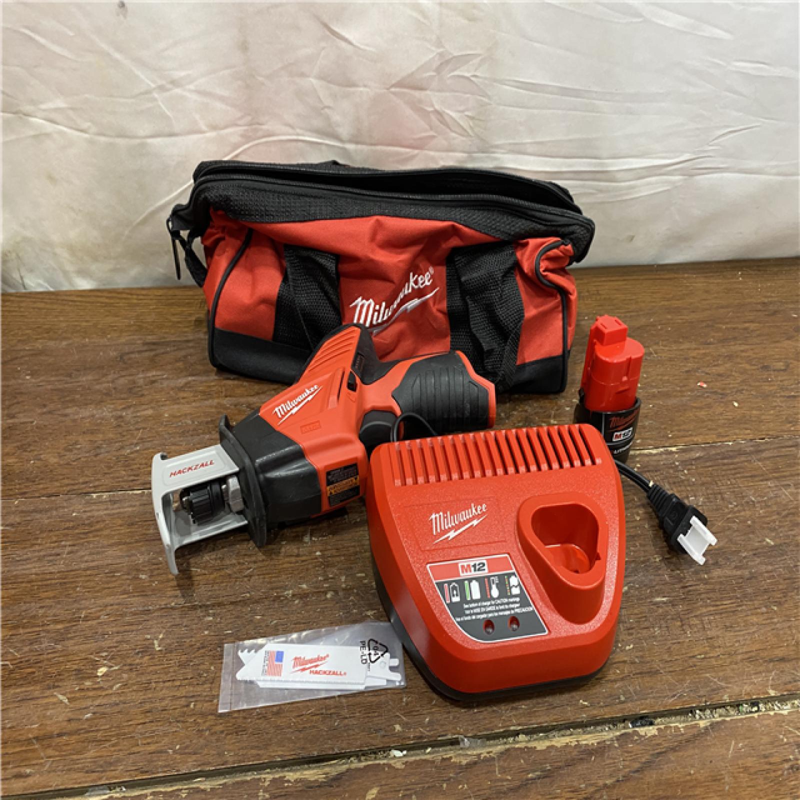 AS-IS Milwaukee 2420-21 - M12 Fuel Hackzall 1/2  12V 1.5Ah Cordless Straight Handle Reciprocating Saw Kit