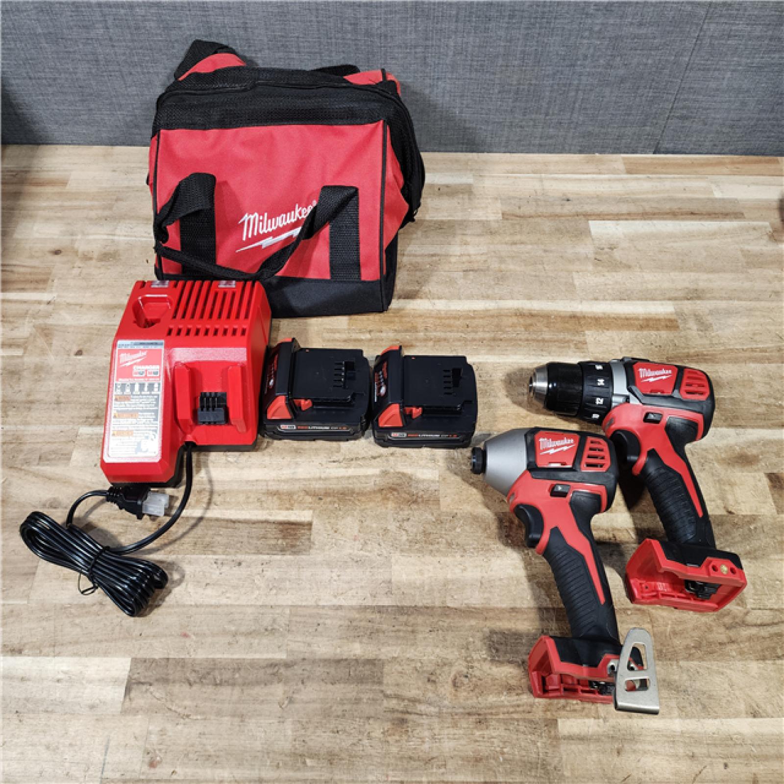 HOUSTON LOCATION - AS - IS Milwaukee 18V Lithium-Ion Cordless Drill Driver/Impact Driver Combo Kit