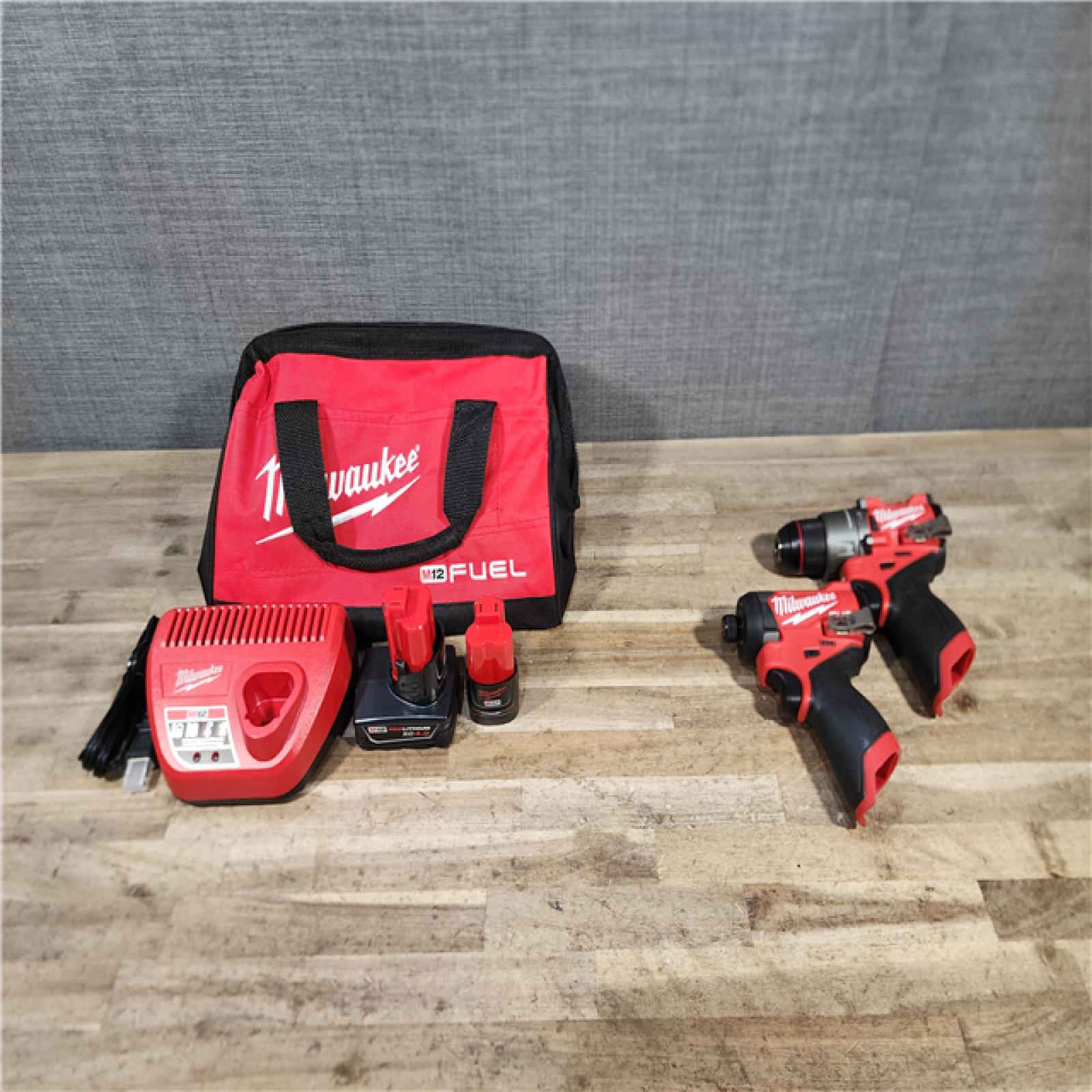HOUSTON LOCATION - AS-IS Milwaukee FUEL 12-Volt Lithium-Ion Brushless Cordless Hammer Drill and Impact Driver Combo Kit