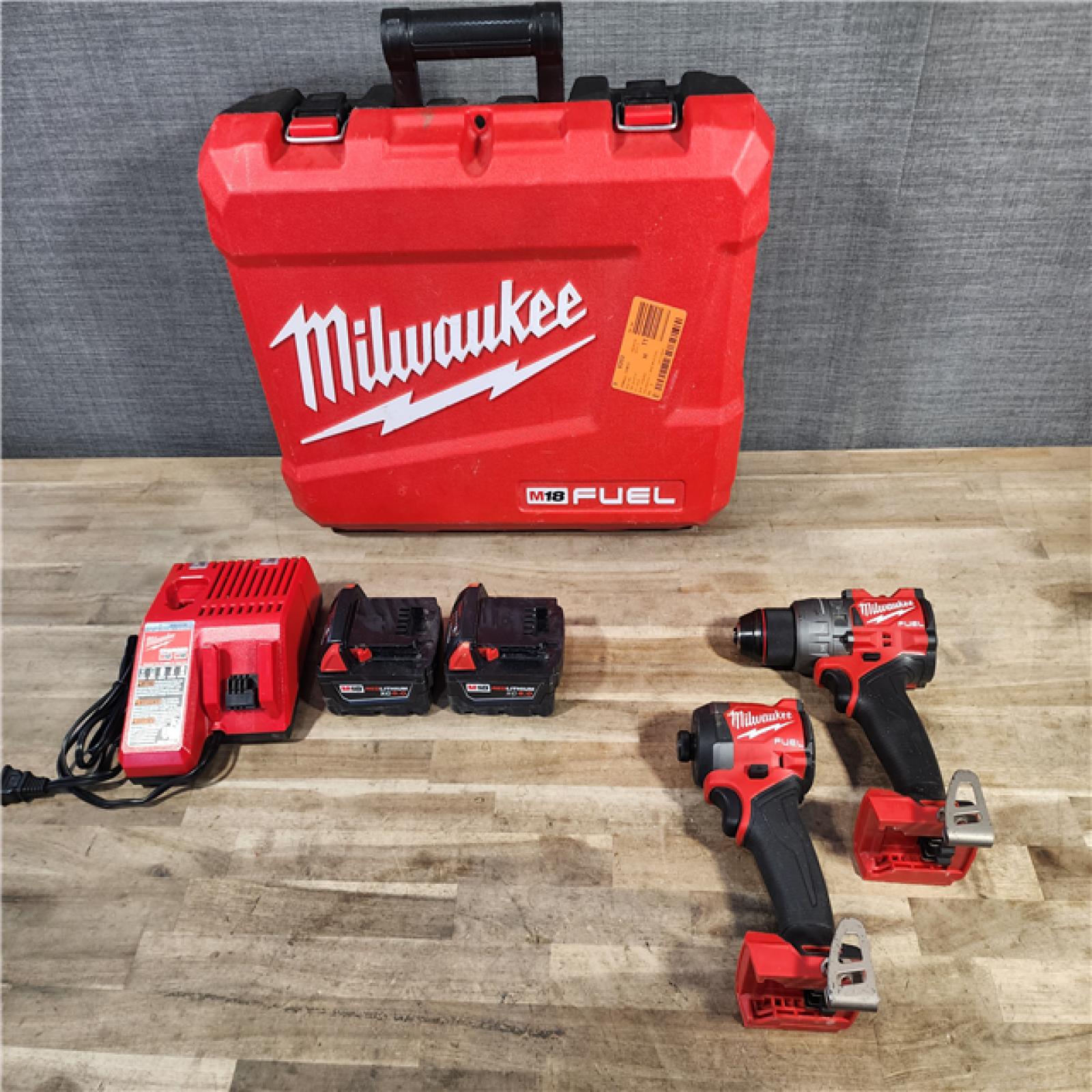 HOUSTON LOCATION - AS-IS MILWAUKEE FUEL 18V Lithium-Ion Brushless Cordless Hammer Drill and Impact Driver Combo Kit