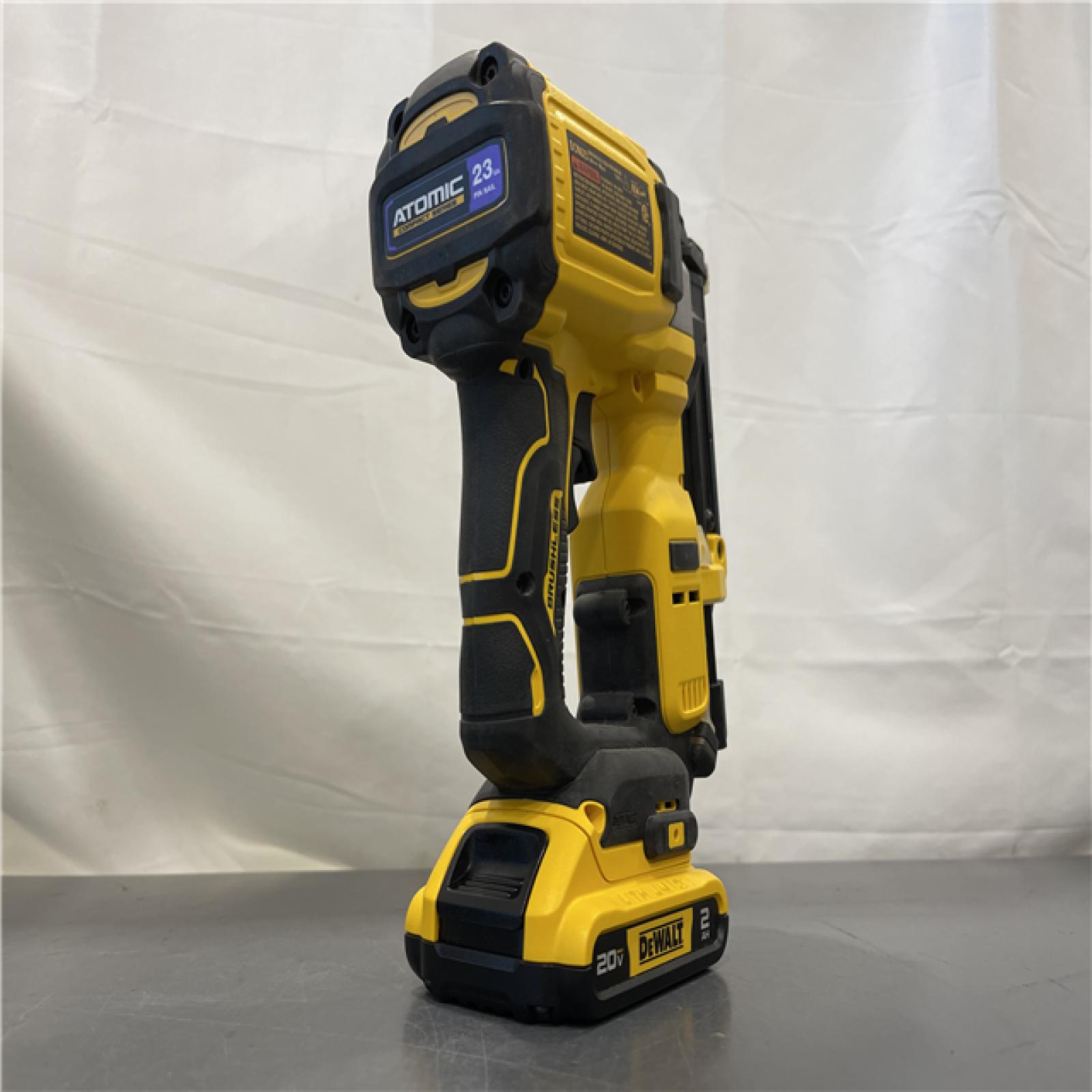 AS-IS - DeWalt 20-Volt MAX Atomic Compact Cordless Pin Nailer Kit