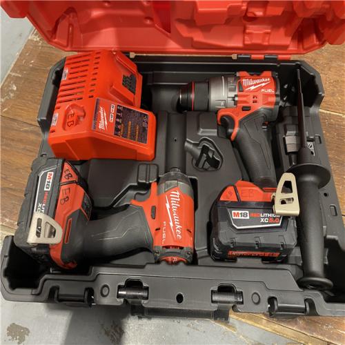 AS-IS MILWAUKEE M18 FUEL 18V Lithium-Ion Brushless Cordless Hammer Drill and Impact Driver Combo Kit (2-Tool) with 2 Batteries