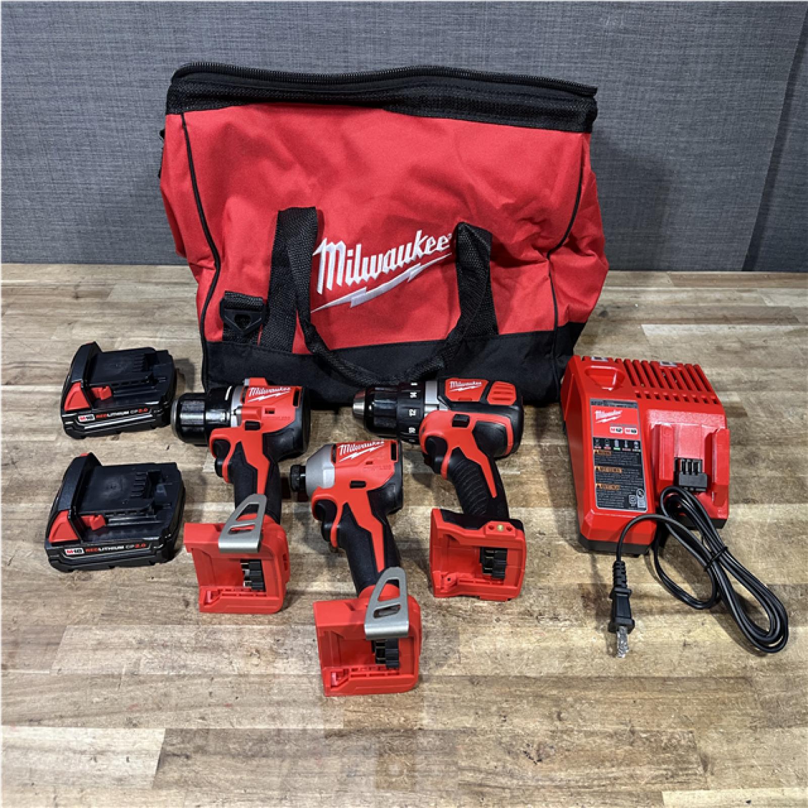 Houston Location AS-IS Milwaukee Drill Drivers QTY/2 and Impact Driver and Impact Driver and Batteries QTY/2 with Charger