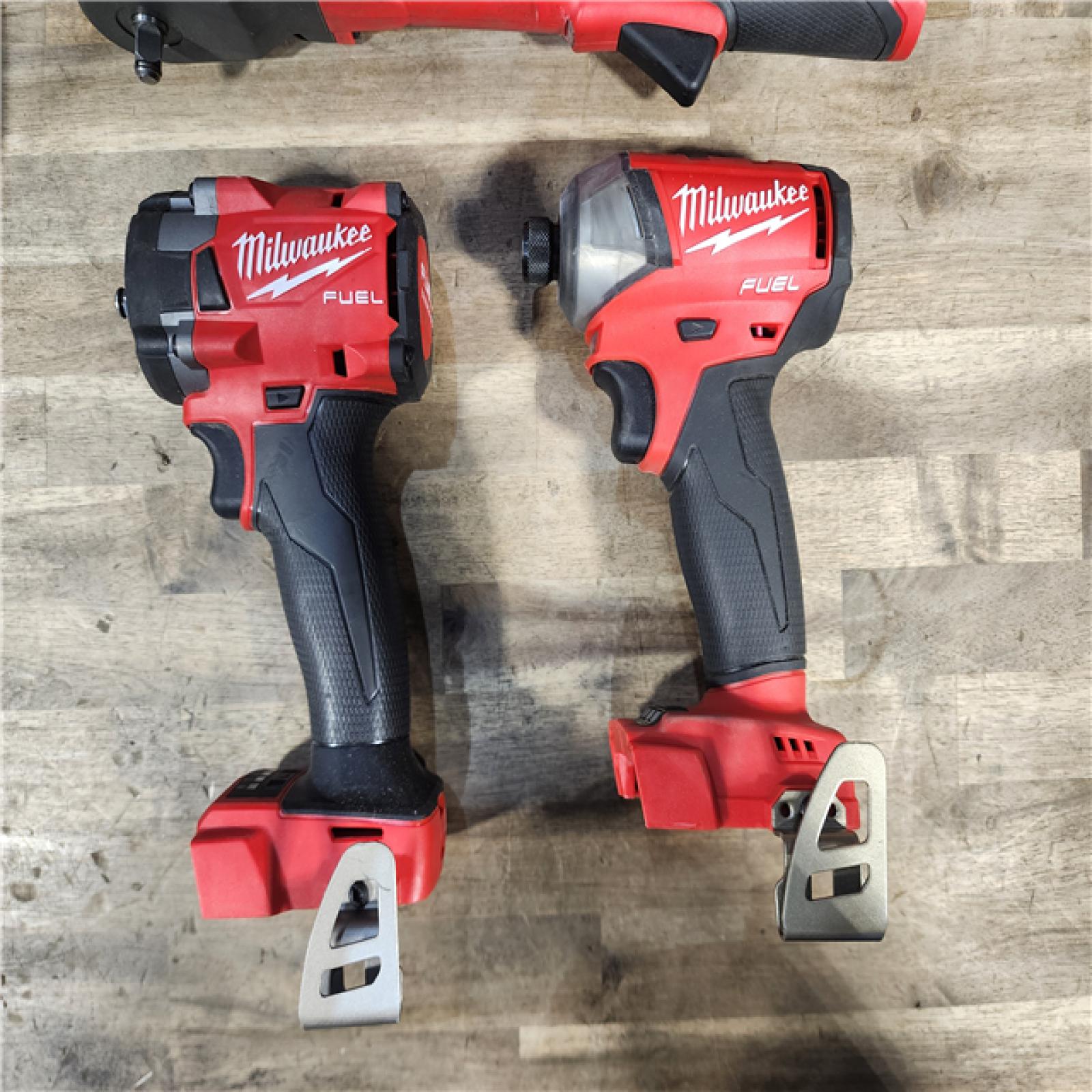 HOUSTON LOCATION - AS-IS MILWAUKEE 4 TOOL COMBO KIT W/ (2) BATTERY & CHARGER