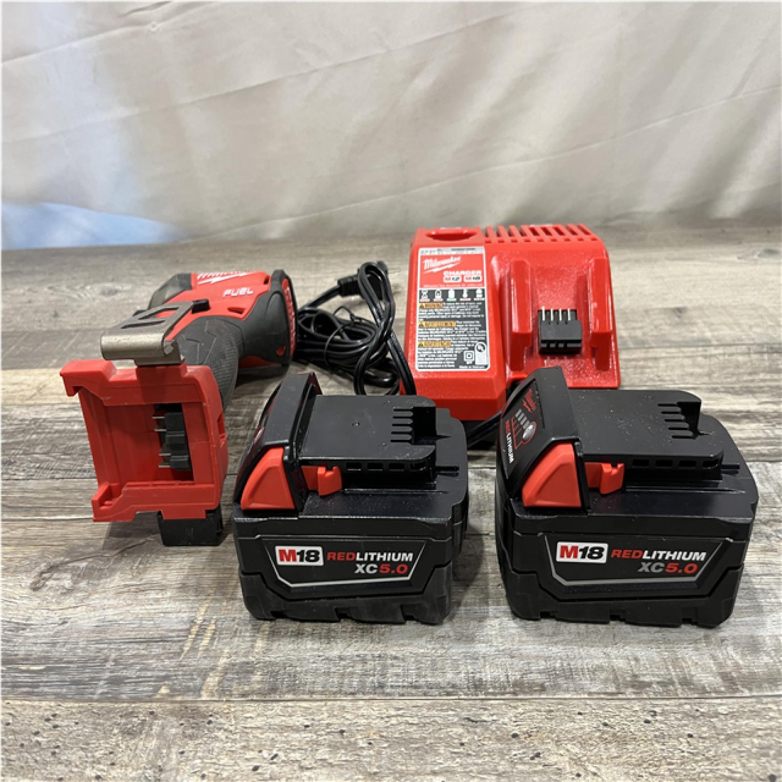 AS-IS Milwaukee FUEL SURGE 18-Volt Lithium-Ion Brushless Cordless 1/4 in. Hex Impact Driver Compact Kit
