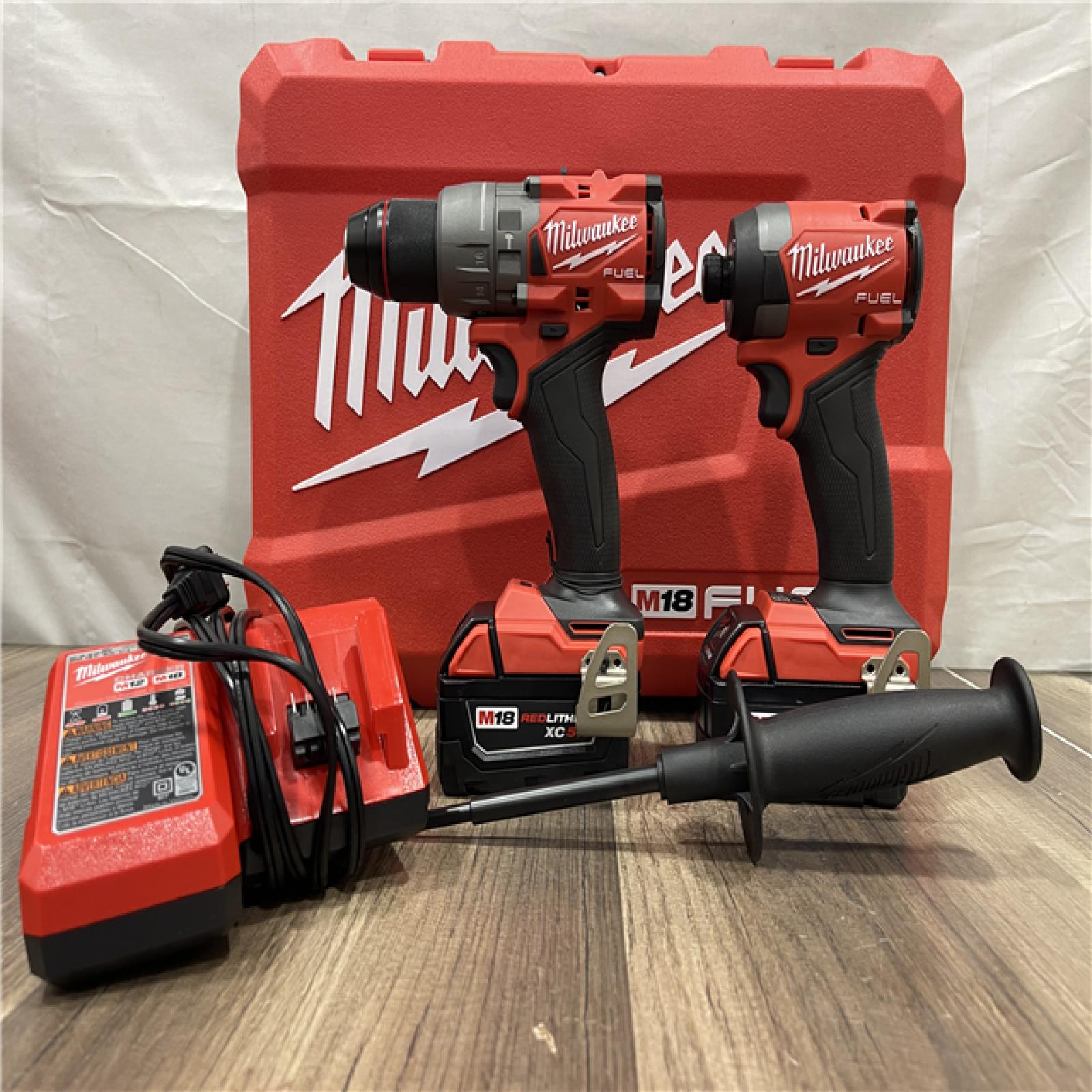 AS-IS Milwaukee FUEL 18V Lithium-Ion Brushless Cordless Hammer Drill and Impact Driver Combo Kit