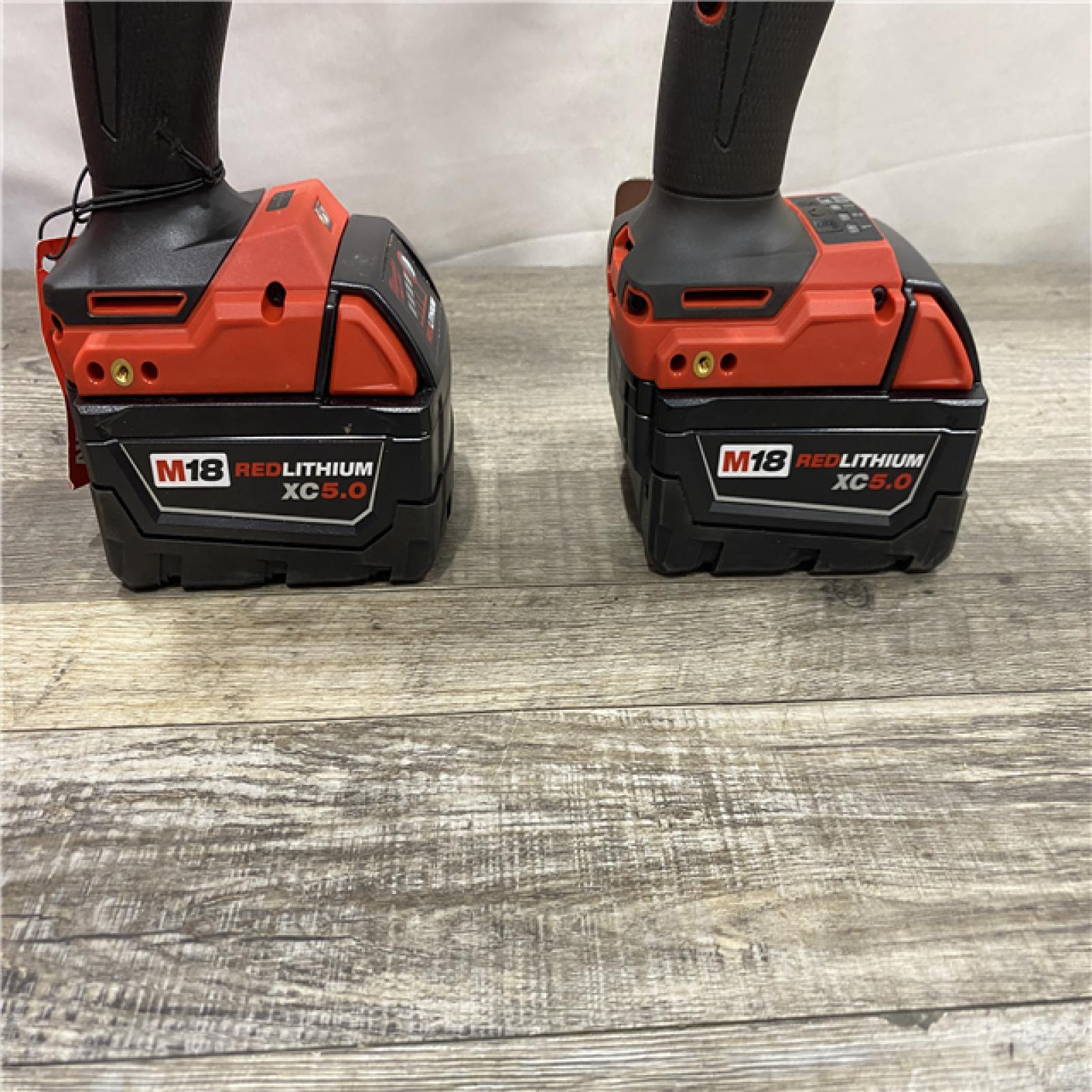 AS-IS Milwaukee  FUEL 18V Lithium-Ion Brushless Cordless Hammer Drill and Impact Driver Combo Kit