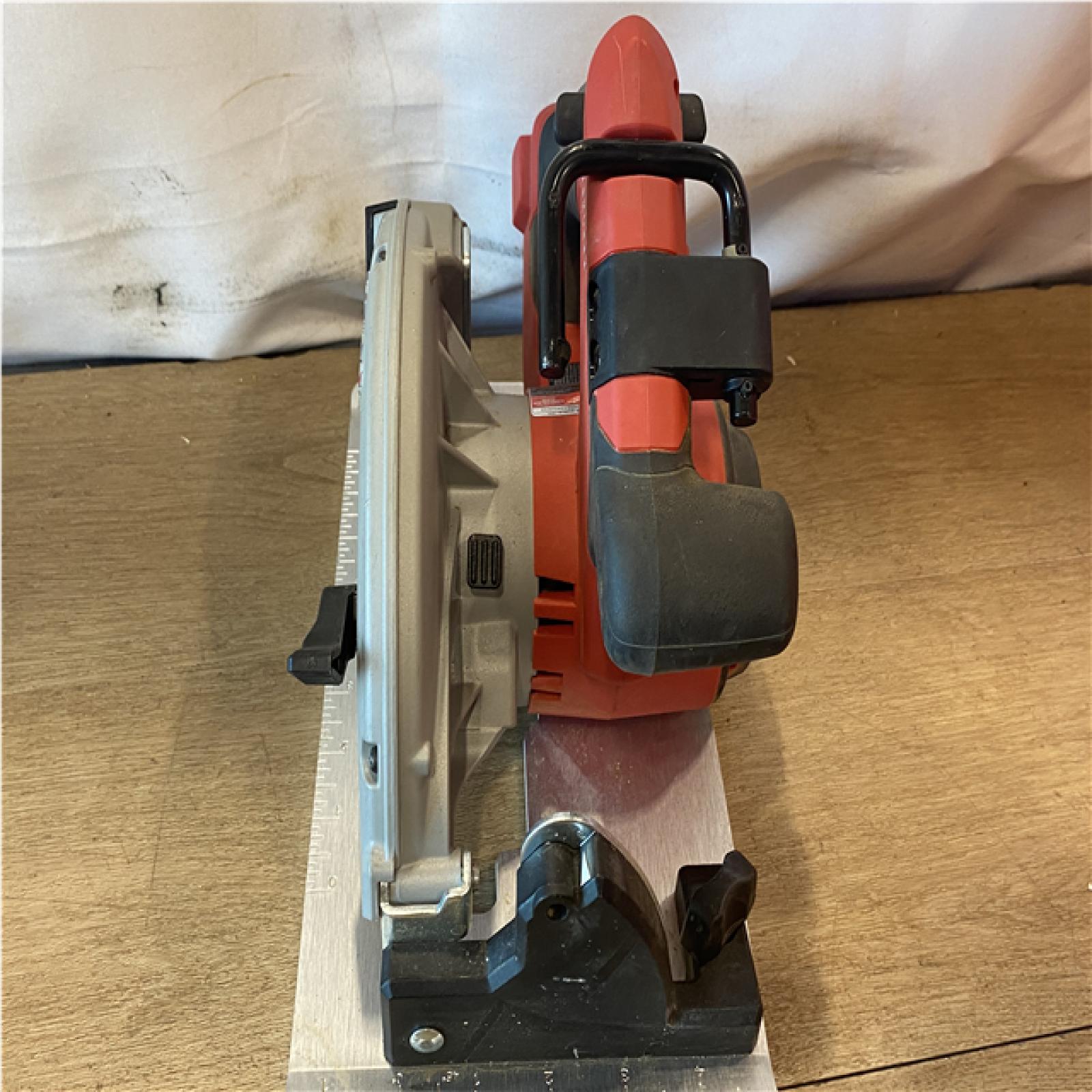 AS-IS Milwaukee FUEL 18V Lithium-Ion Brushless Cordless 6-1/2 in. Circular Saw (Tool-Only)