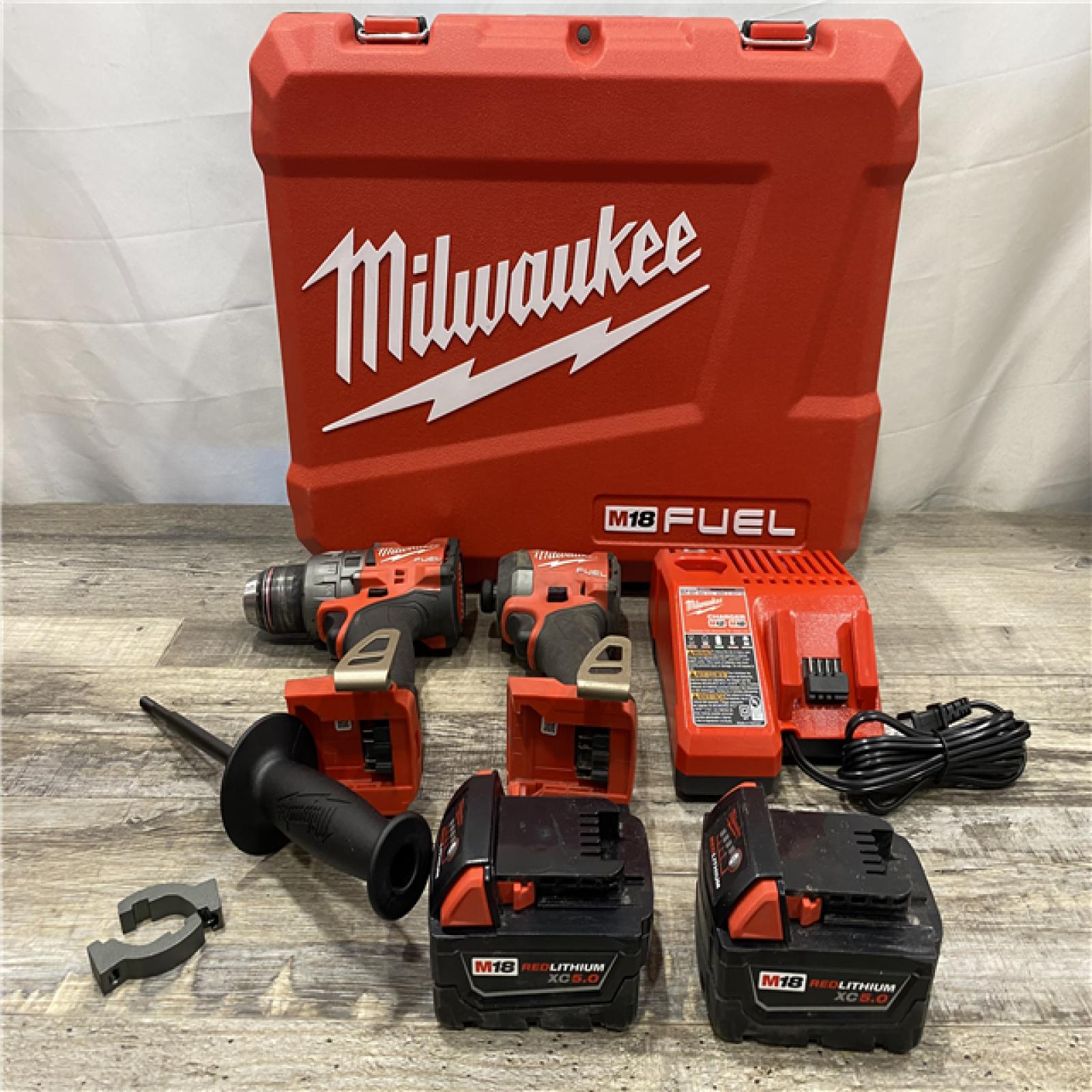 AS-IS Milwaukee FUEL 18V Lithium-Ion Brushless Cordless Hammer Drill and Impact Driver Combo Kit