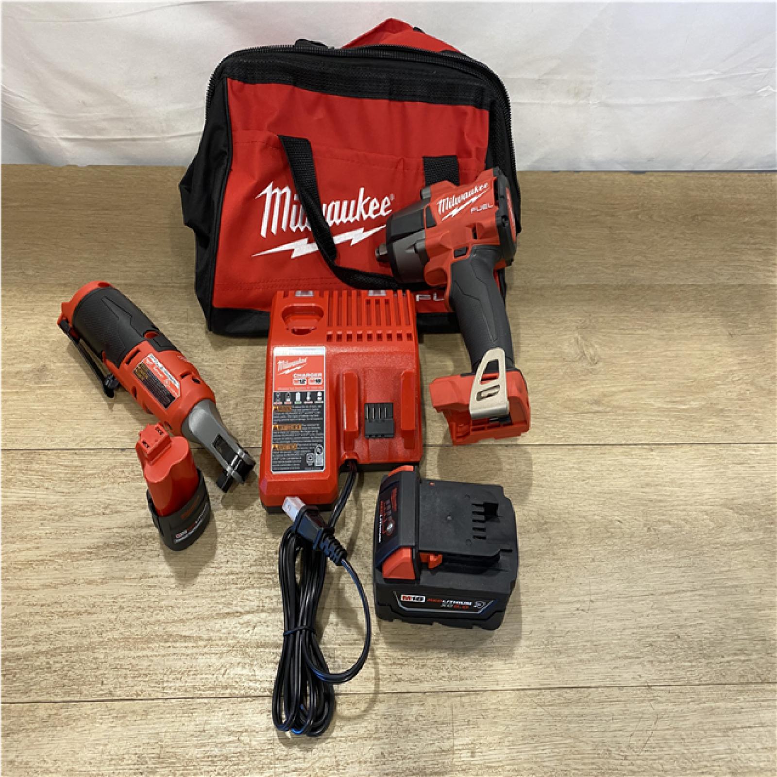 AS-IS - Milwaukee FUEL 18V Cordless Mid Torque 1/2 in. Impact Wrench w/ 12 FUEL 3/8 in. Ratchet Combo Kit