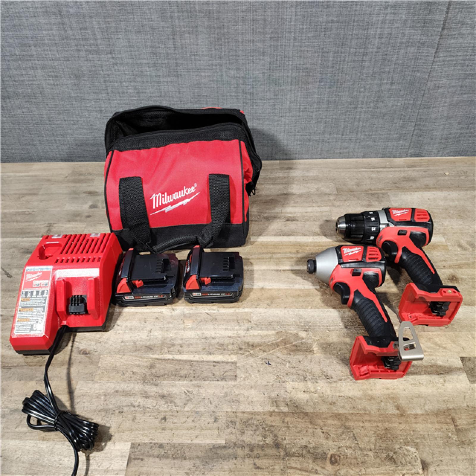 HOUSTON LOCATION - AS-IS Milwaukee M18 Brushed Cordless (2-Tool) Drill/Driver and Impact Driver Kit
