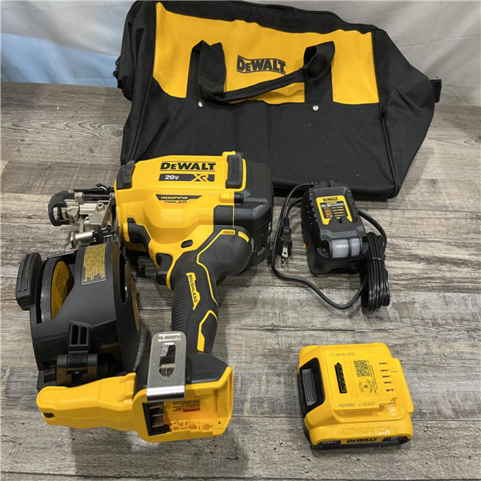 AS-IS DEWALT 20V MAX Lithium-Ion 15-Degree Electric Cordless Roofing Nailer Kit