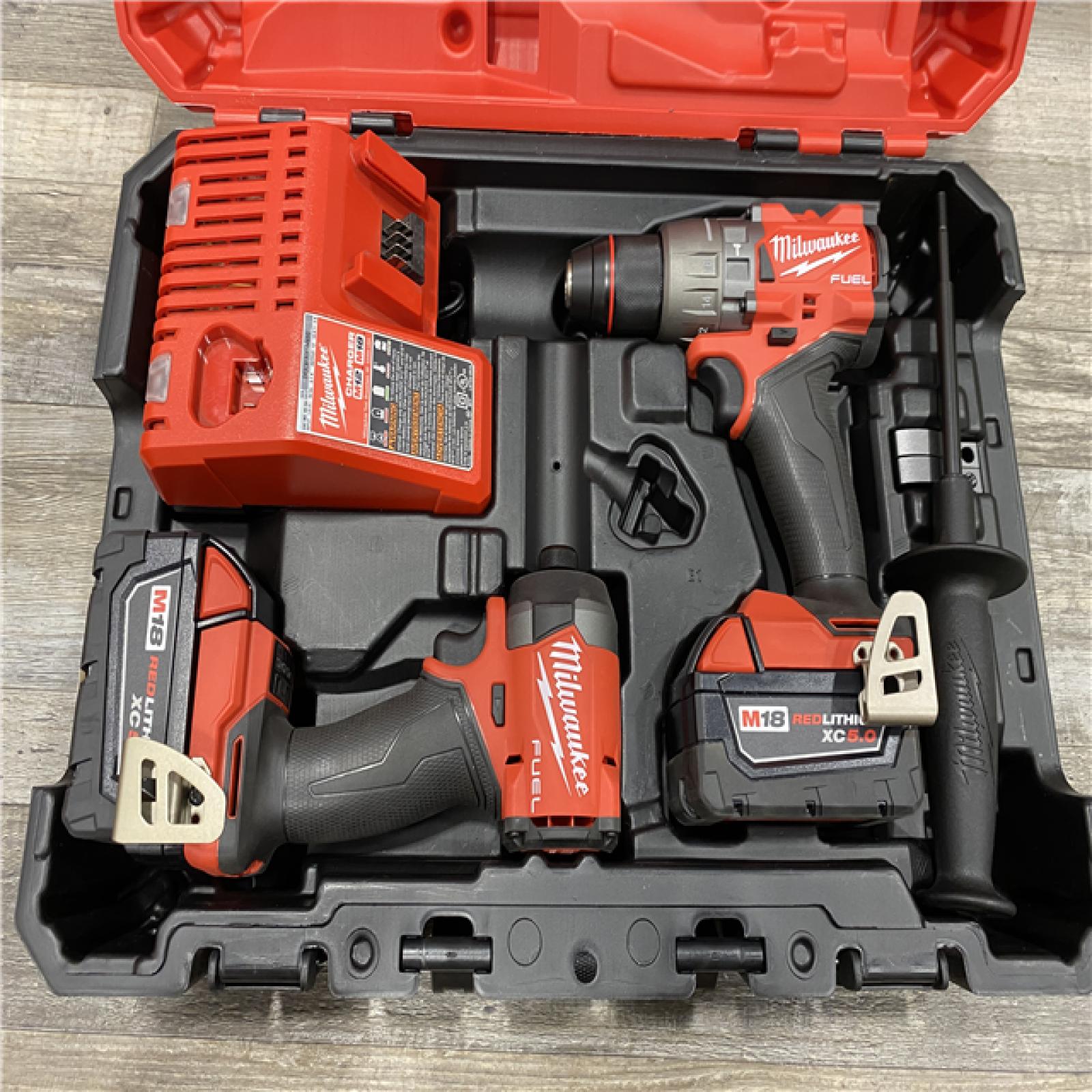 AS-IS Milwaukee FUEL 18V Lithium-Ion Brushless Cordless Hammer Drill and Impact Driver Combo Kit