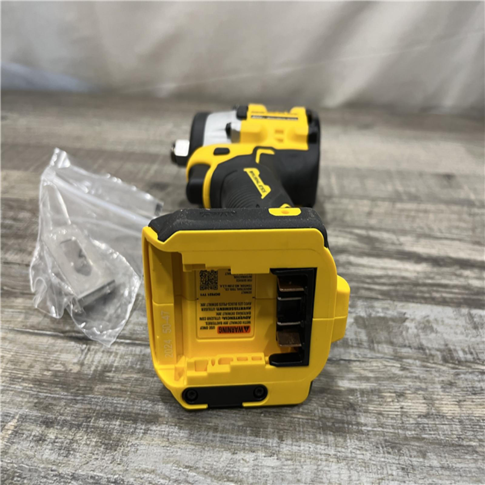 AS-IS DEWALT ATOMIC 20V MAX Cordless Brushless 1/2 in. Variable Speed Impact Wrench (Tool Only)