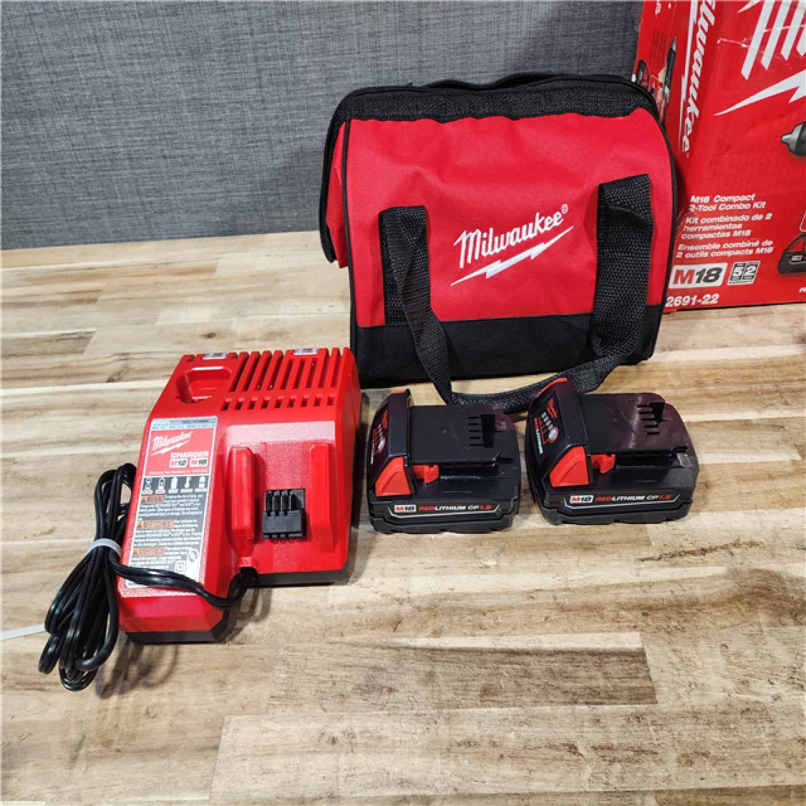 HOUSTON LOCATION - AS-IS Milwaukee 18V Lithium-Ion Cordless Drill Driver/Impact Driver Combo Kit