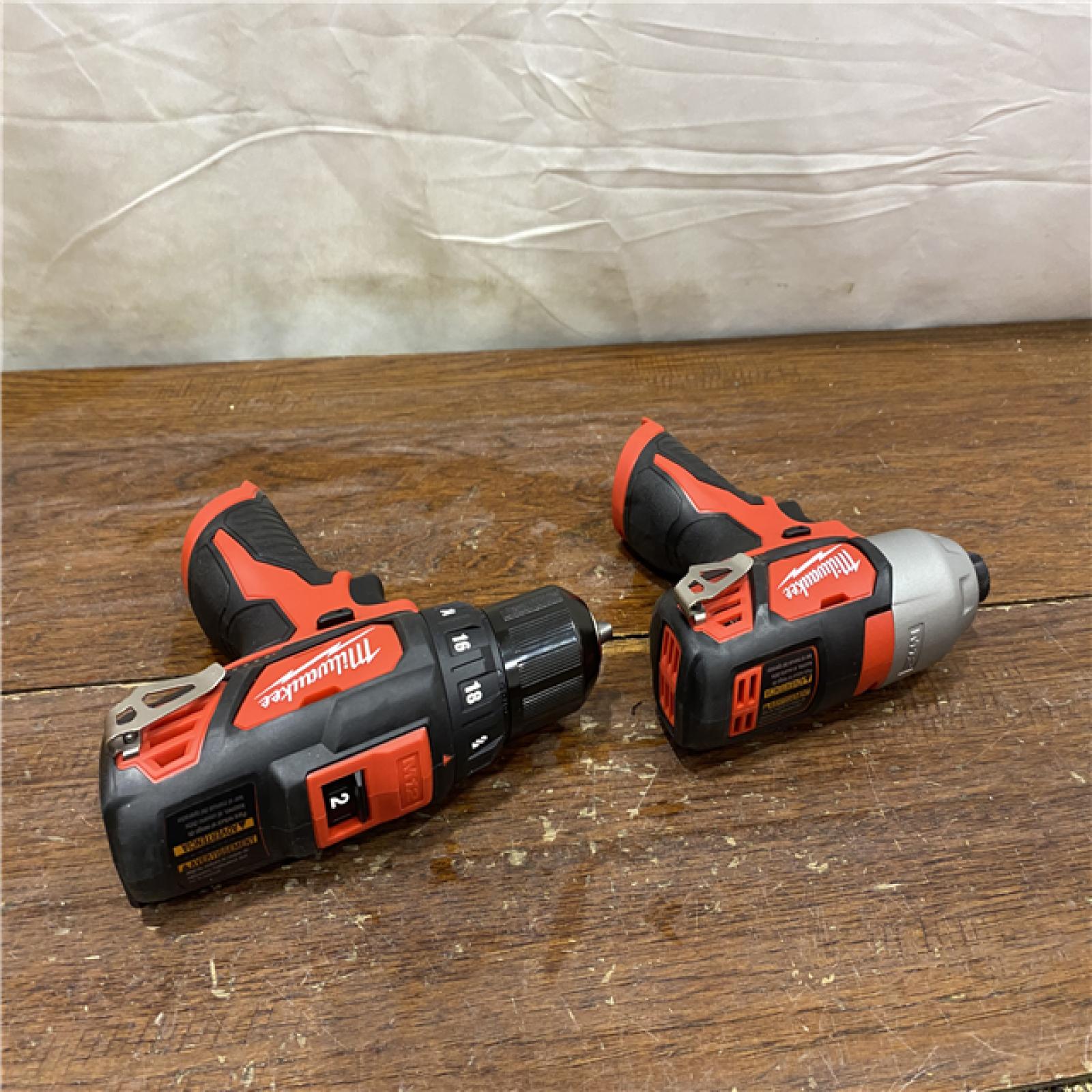 AS-IS  Milwaukee M12 12V Lithium-Ion Cordless Drill Driver/Impact Driver Combo Kit with Two 1.5Ah Batteries, Charger and Bag (2-Tool)