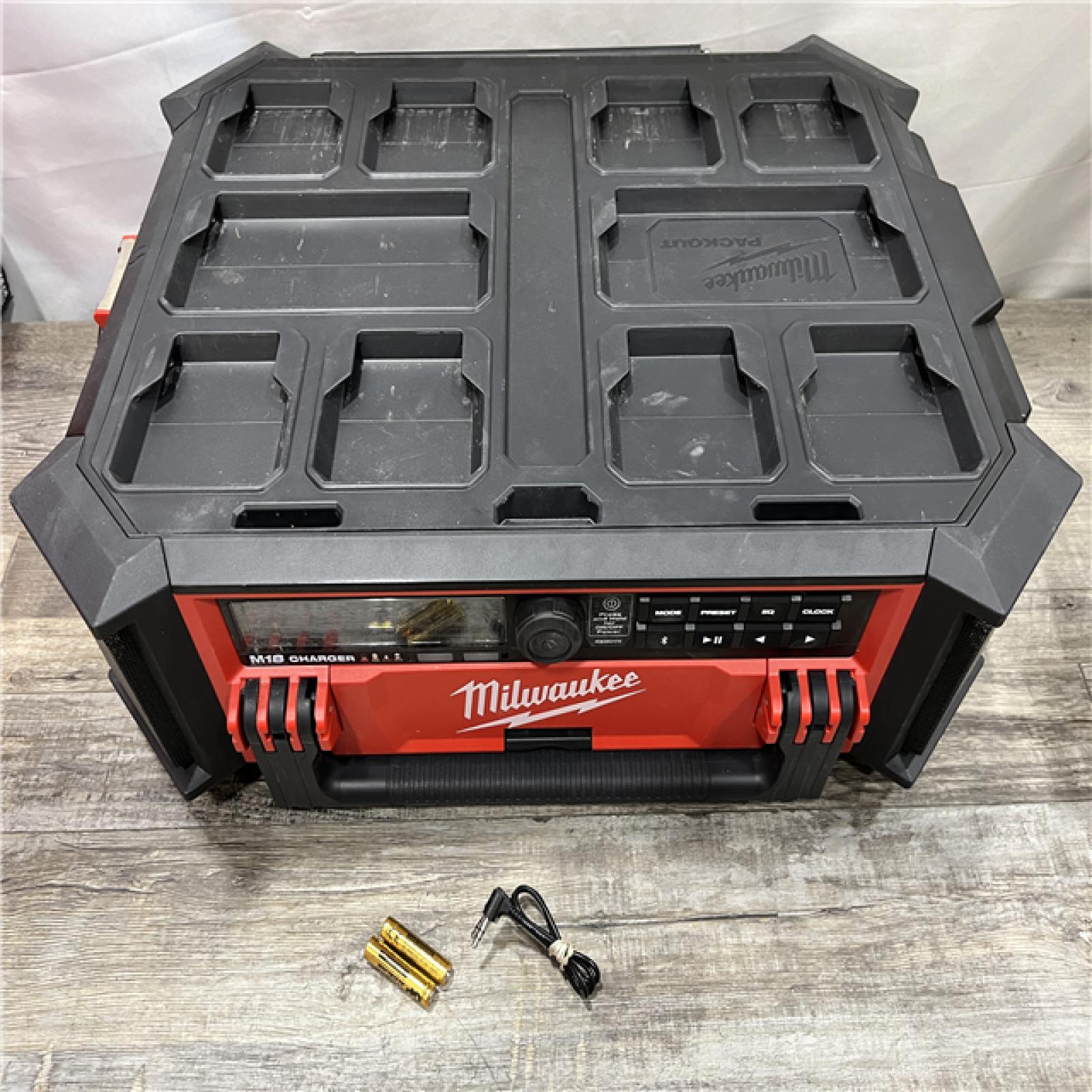 AS-IS Milwaukee Lithium-Ion Cordless PACKOUT Radio/Speaker with Built-In Charger