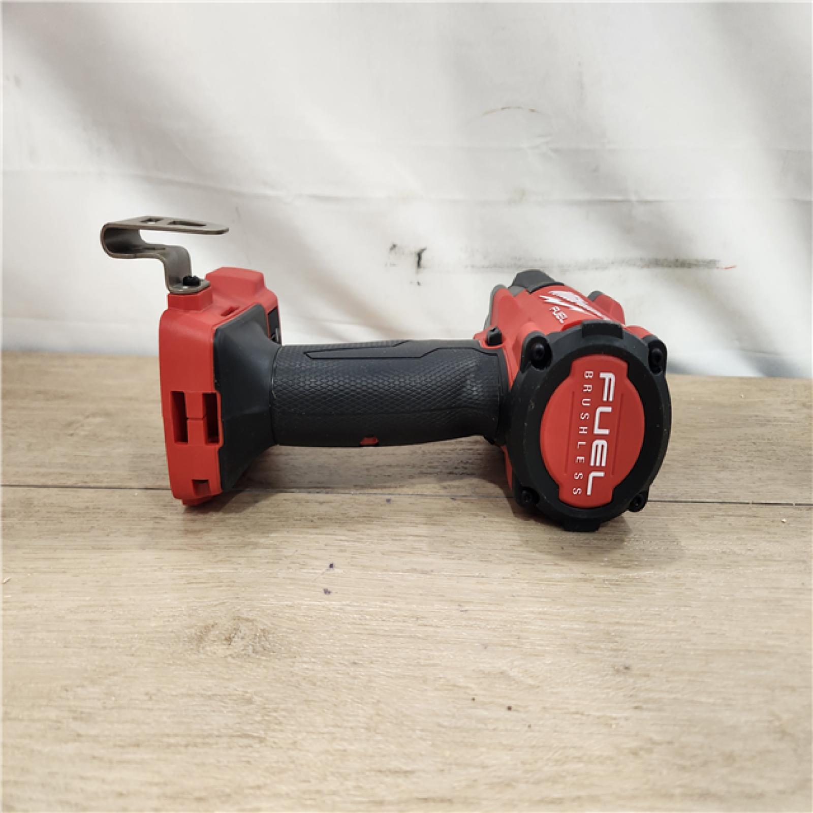 AS-IS- Milwaukee M18 18V Fuel 1/2  Mid-Torque Impact Wrench Cordless Lithium-Ion Brushless with Friction Ring (TOOL ONLY)