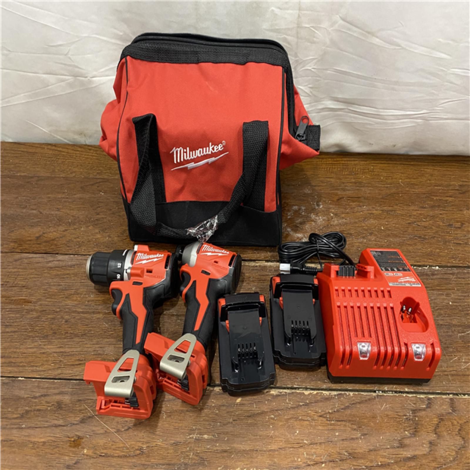 AS-IS  Milwaukee M18 Compact Brushless 2-Tool Combo Kit