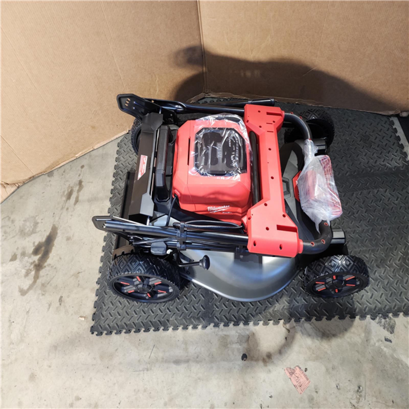 HOUSTON LOCATION - AS-IS Milwaukee M18 FUEL Brushless Cordless 21 in. Walk Behind Dual Battery Self-Propelled Mower Kit W/ CHARGER