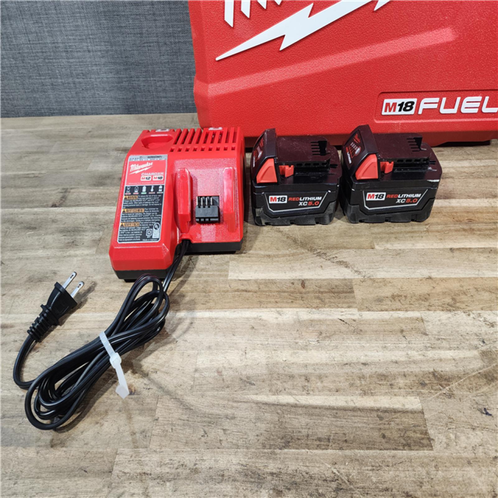 HOUSTON LOCATION - AS-IS Milwaukee FUEL 18V Lithium-Ion Brushless Cordless Hammer Drill and Impact Driver Combo Kit
