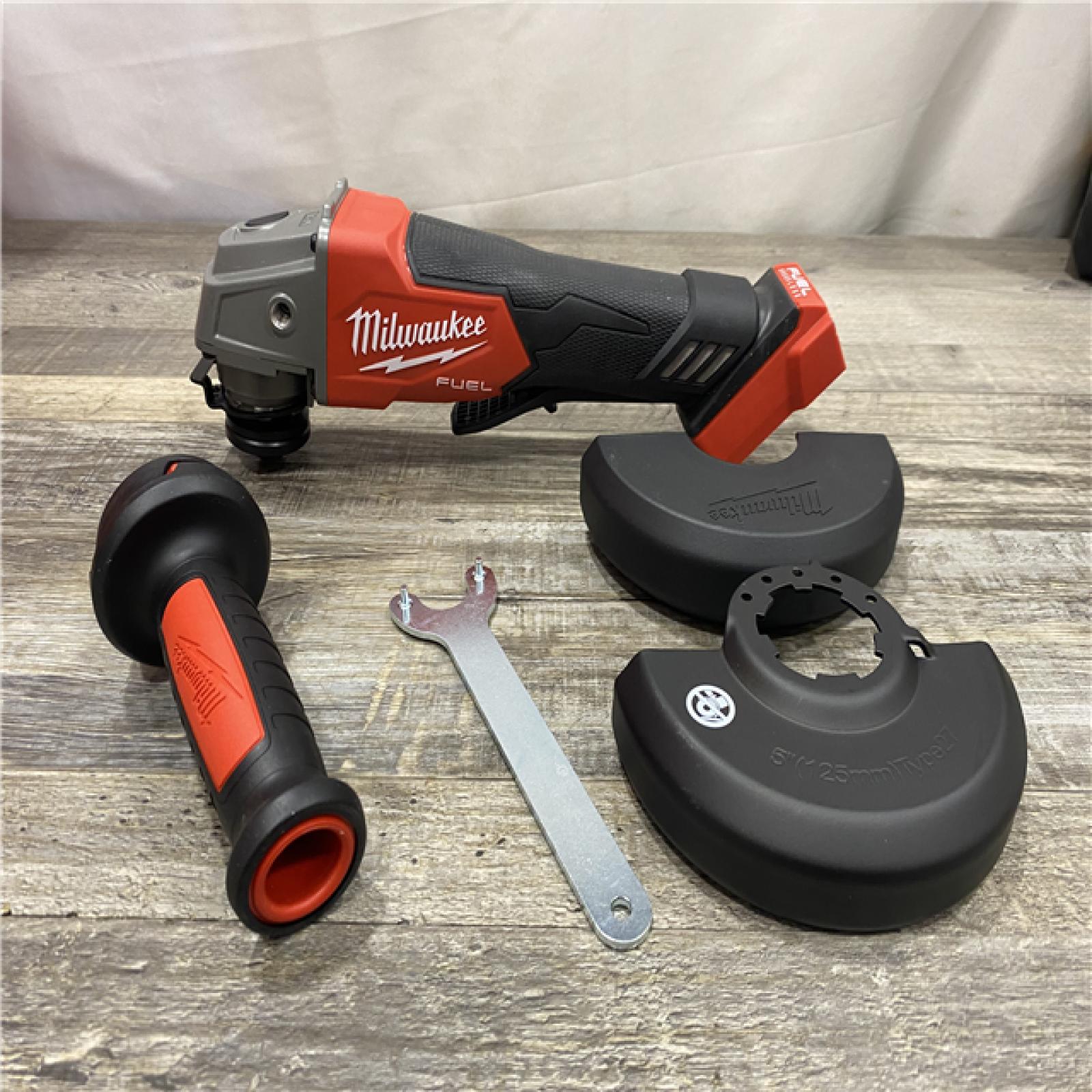 AS-IS Milwaukee FUEL 18V Lithium-Ion Brushless Cordless 4-1/2 in./5 in. Grinder w/Paddle Switch (Tool-Only)
