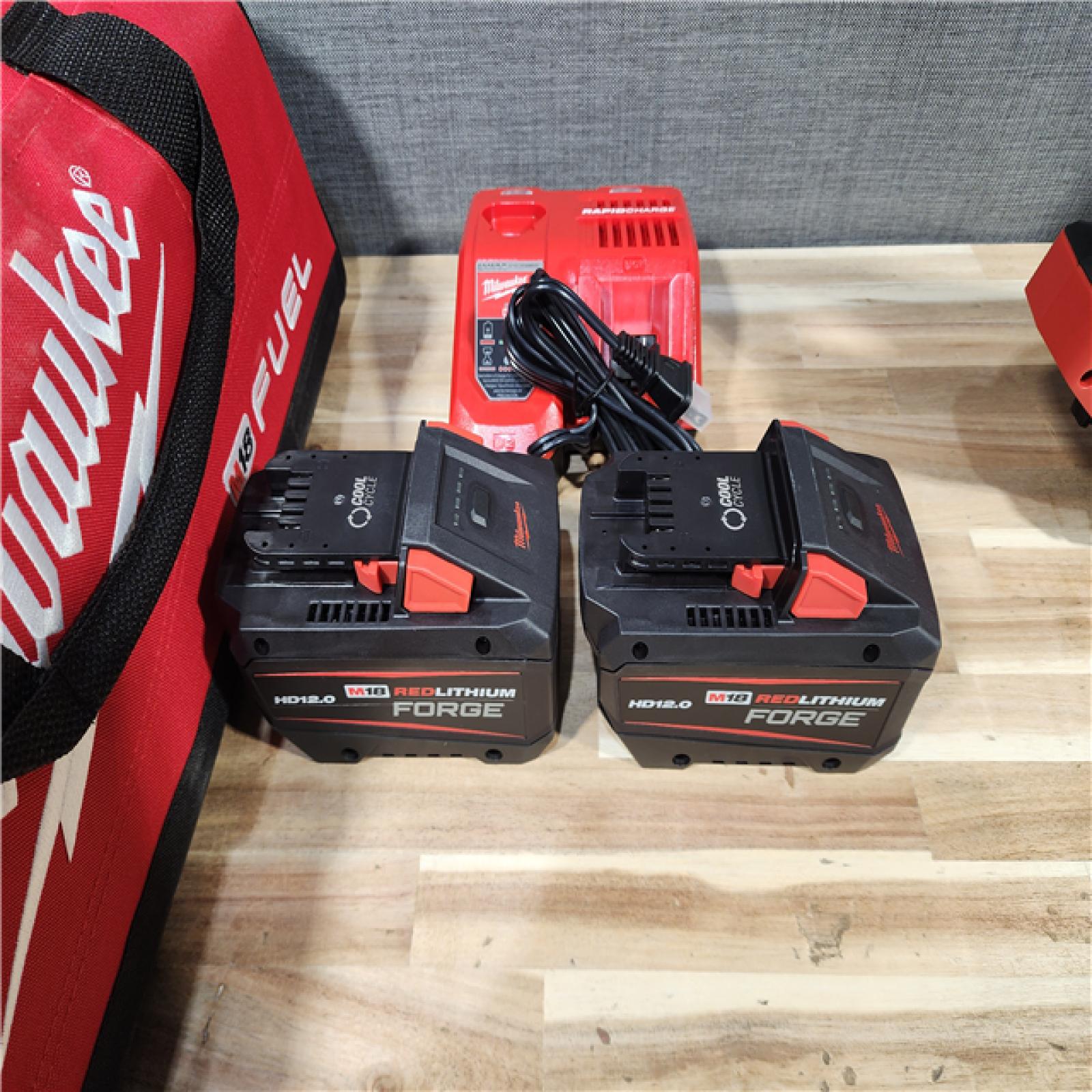 HOUSTON LOCATION - AS-IS (APPEARS LIKE NEW) Milwaukee M18 FUEL 18V Lithium-Ion Brushless Cordless 1 in. Impact Wrench with D-Handle Kit with (2) 12.0 Ah FORGE Batteries