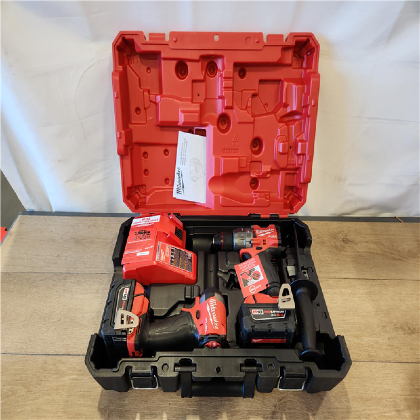 AS-IS- Milwaukee  FUEL 18V Lithium-Ion Brushless Cordless Hammer Drill and Impact Driver Combo Kit