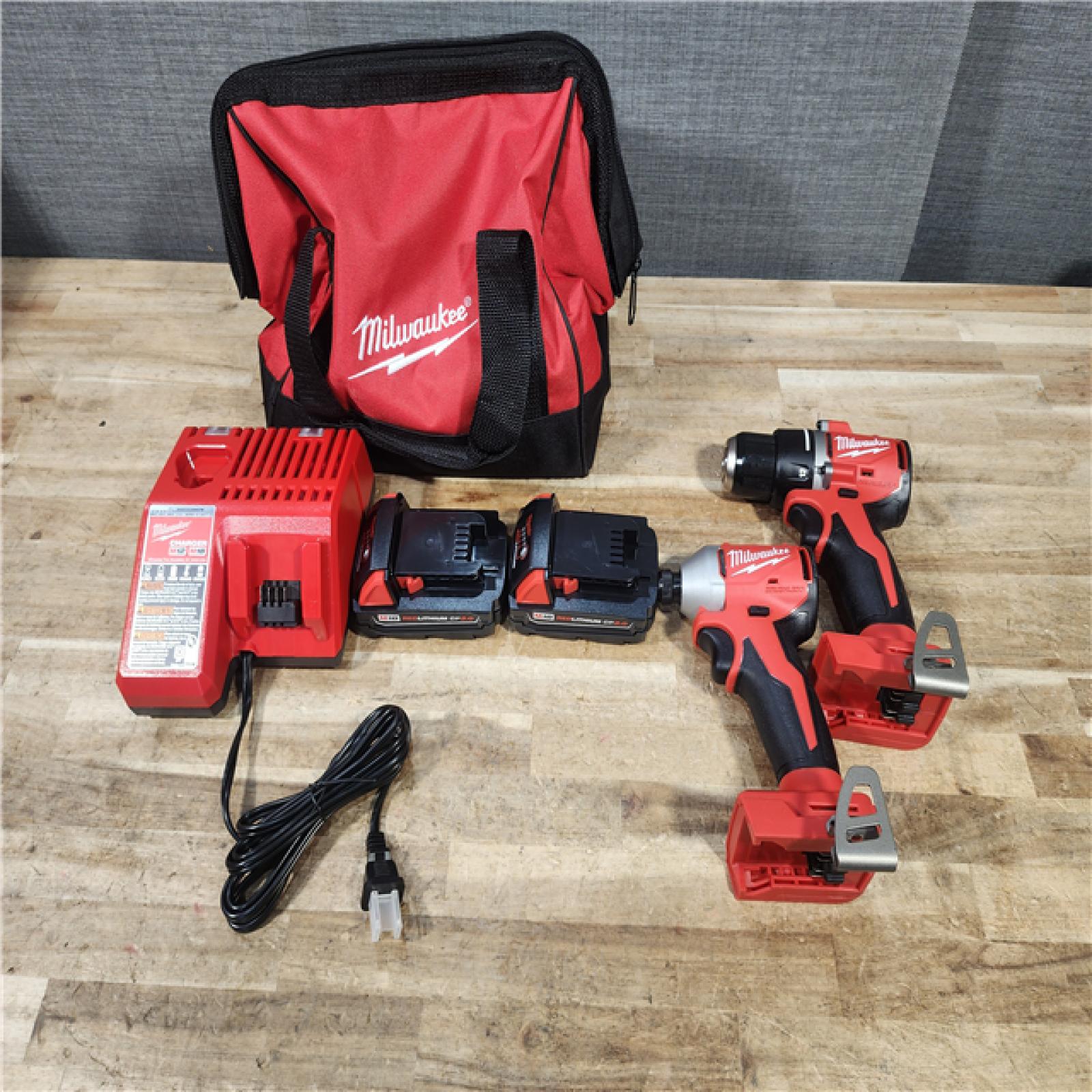 HOUSTON LOCATION - AS - IS Milwaukee 18V Lithium-Ion Brushless Cordless Compact Drill/Impact Combo Kit