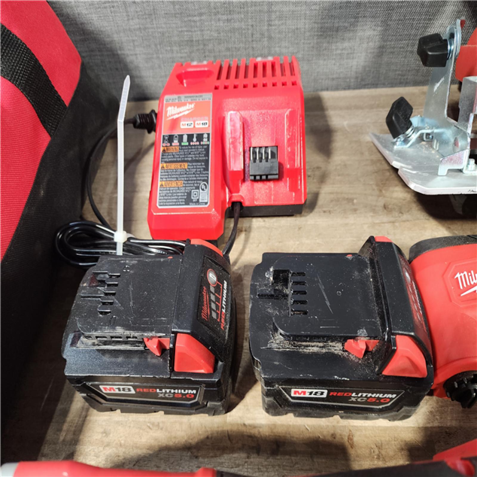 HOUSTON LOCATION - AS-IS MILWAUKEE 9 TOOL COMBO KIT W/ (2) BATTERY & CHARGER