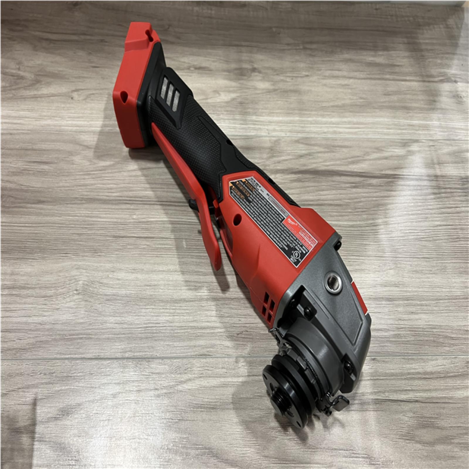 AS-IS Milwaukee FUEL 18V Lithium-Ion Brushless Cordless 4-1/2 in./5 in. Grinder with Variable Speed & Paddle Switch (Tool-Only)
