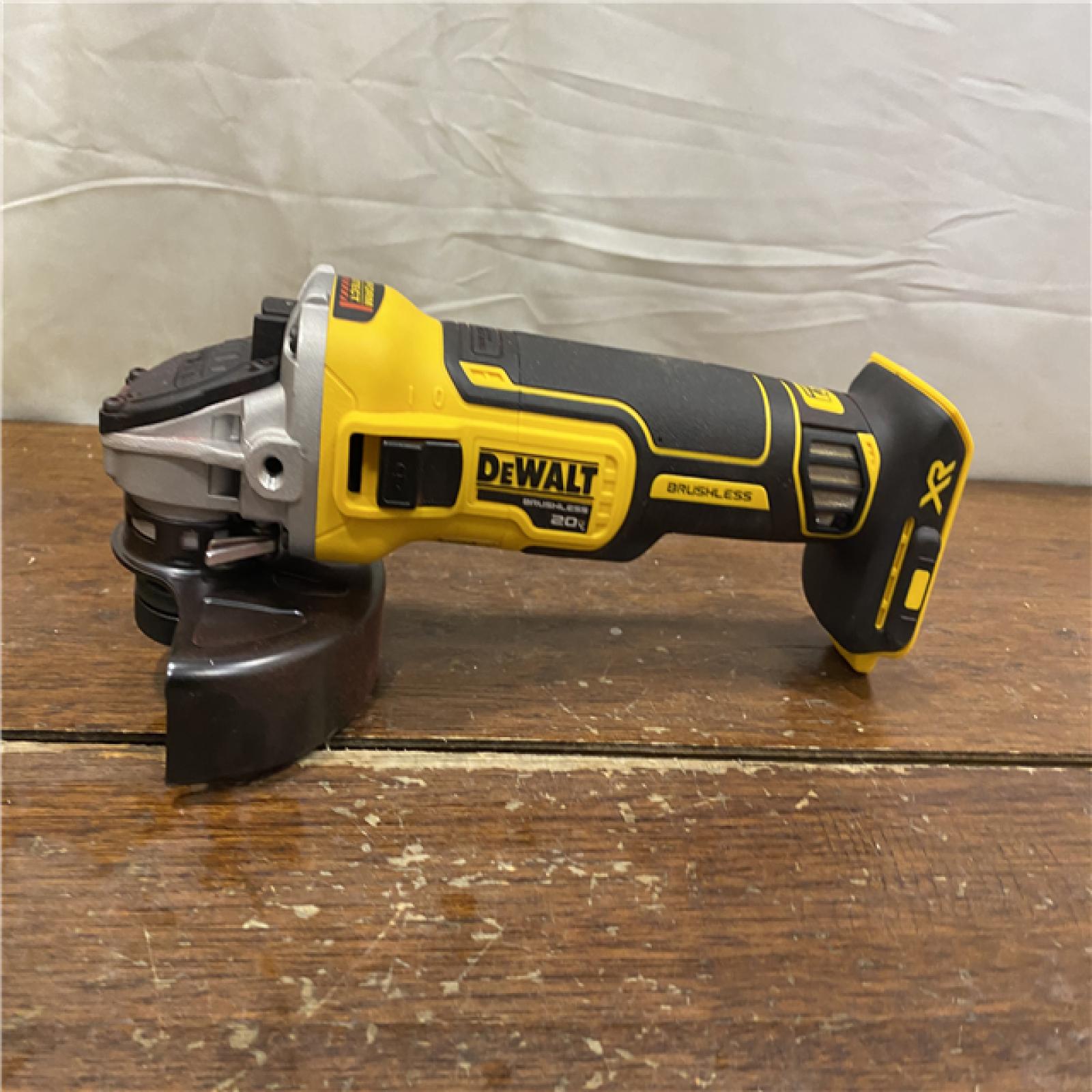 AS-IS DeWalt DCG405B 20V Max XR 4.5-Inch Slide Switch Small Angle Grinder (Tool Only)