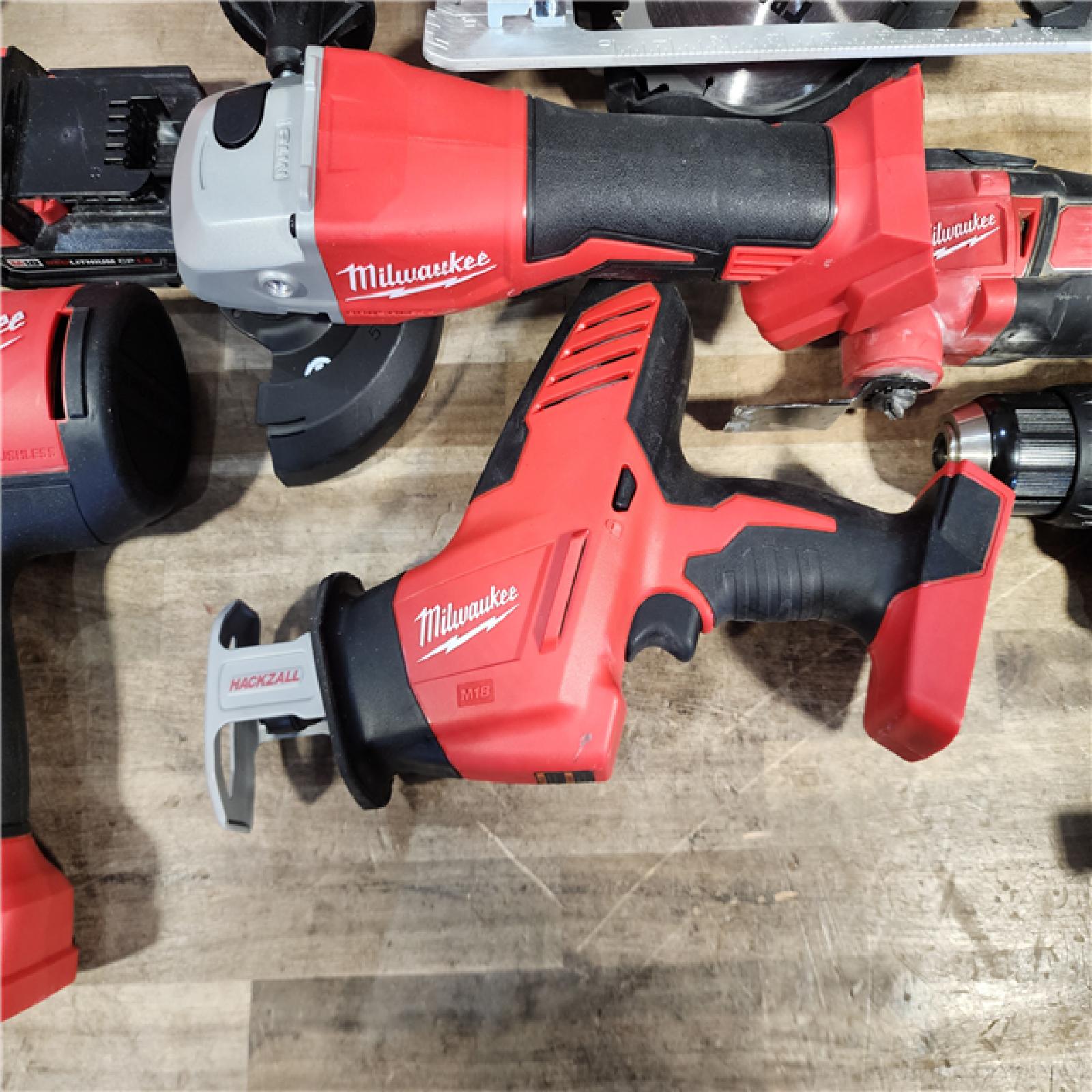 HOUSTON LOCATION - AS-IS MILWAUKEE 9 TOOL COMBO KIT W/ (2) BATTERY & CHARGER