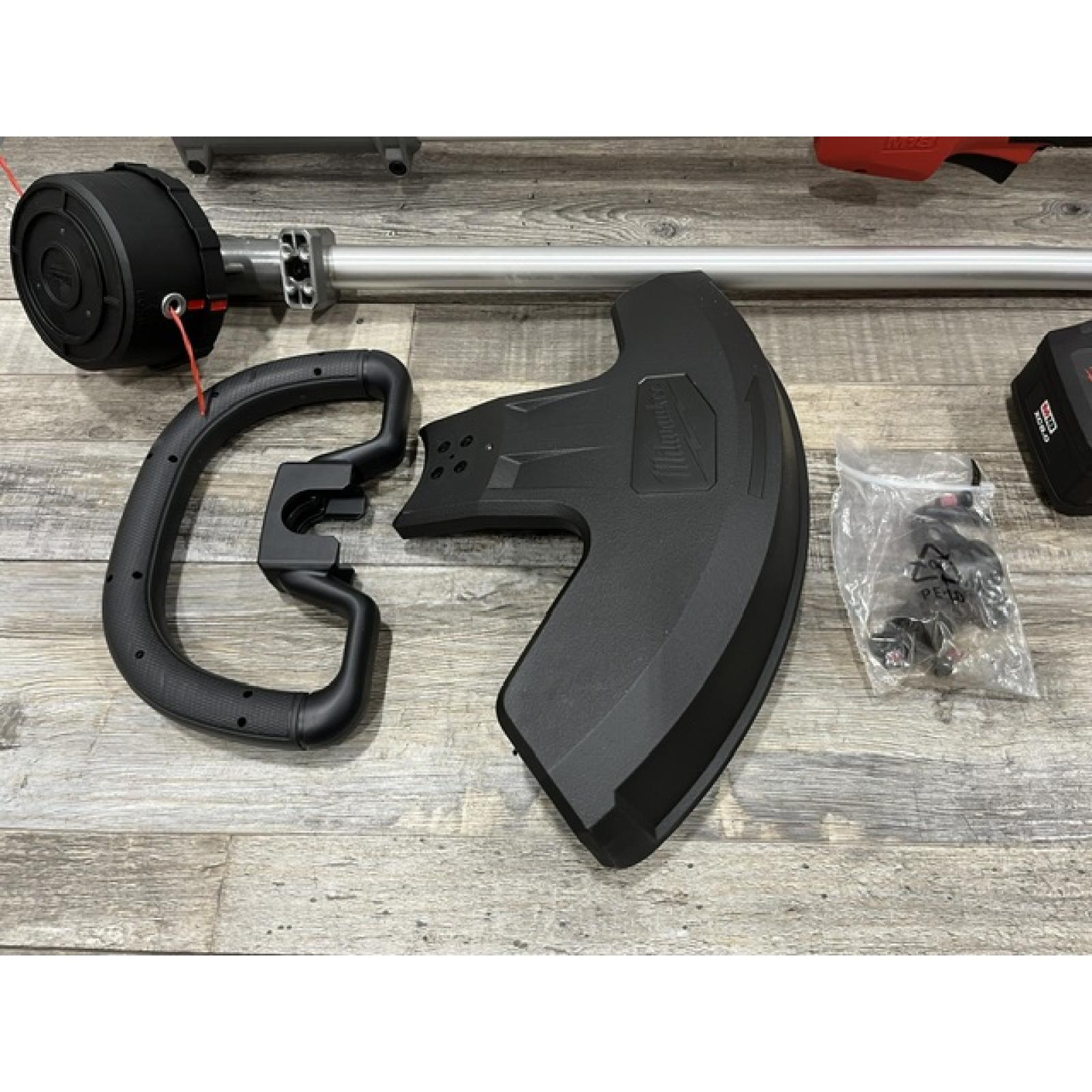 AS-IS Milwaukee FUEL 18V 16 in. Brushless Cordless Battery Powered String Trimmer Kit