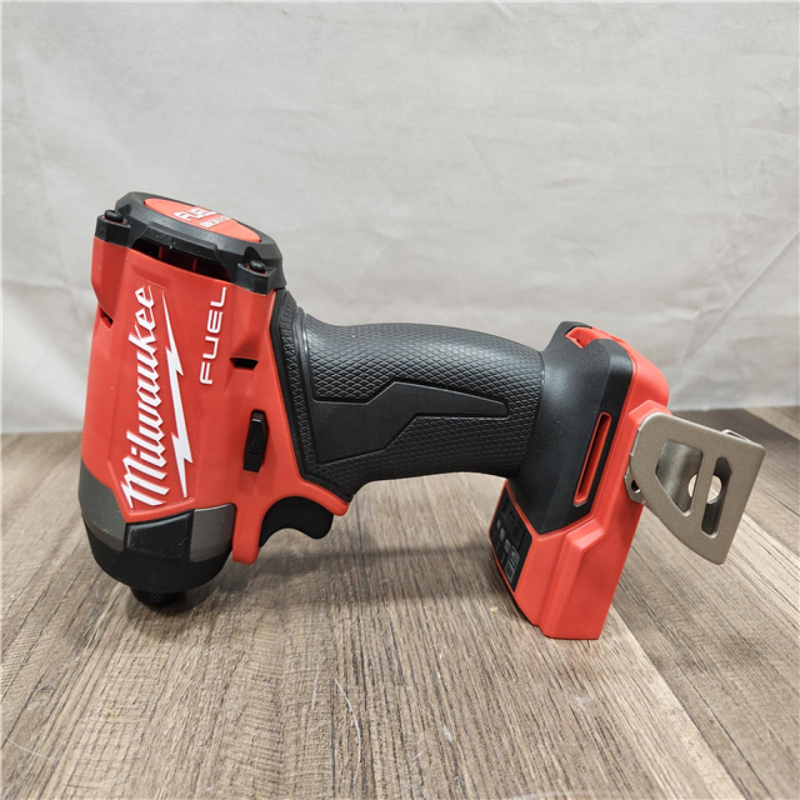 AS-IS- Milwaukee 18V Lithium-Ion Brushless Cordless 1/4 Hex Impact Driver (Tool-Only)