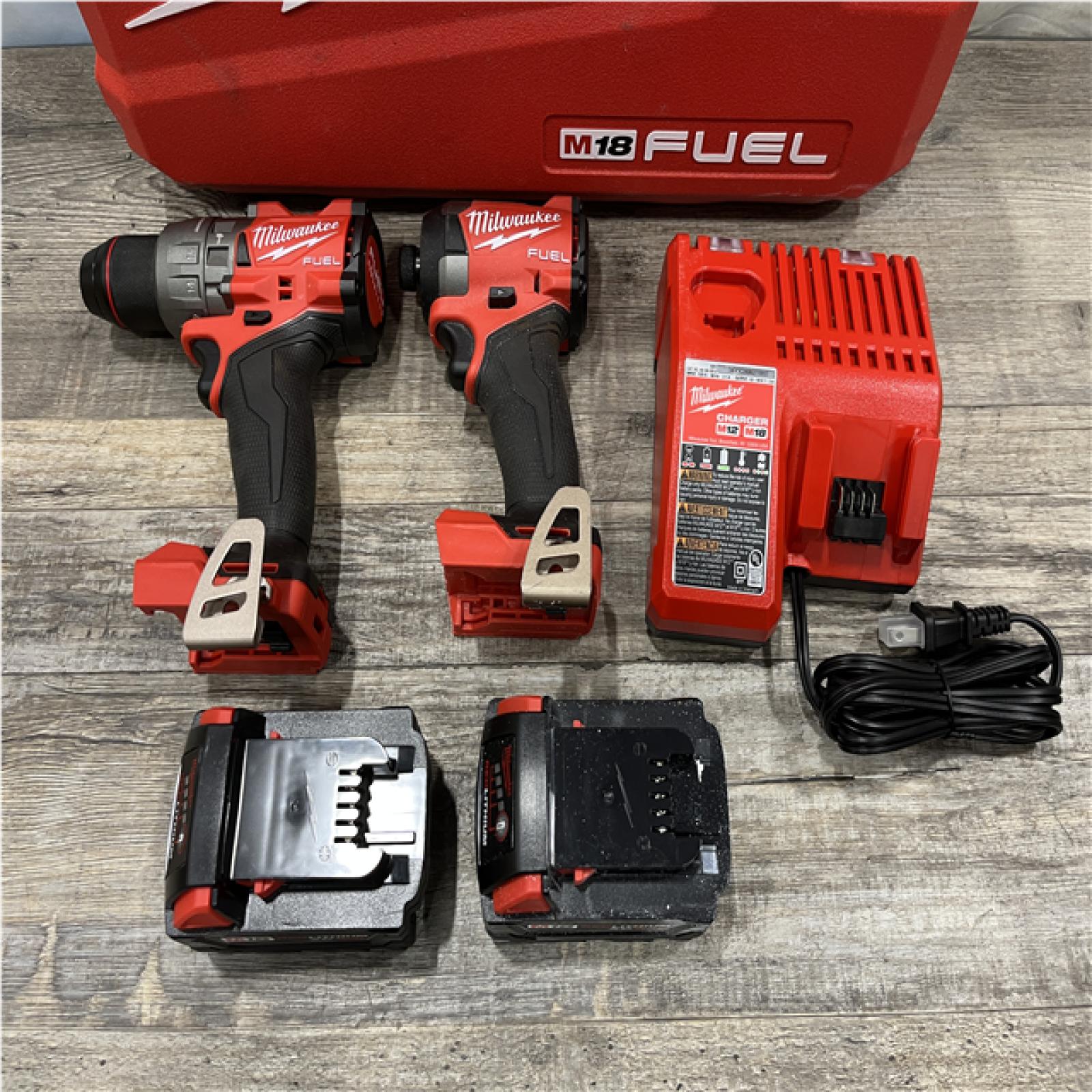 AS-IS Milwaukee FUEL 18V Lithium-Ion Brushless Cordless Hammer Drill and Impact Driver Combo Kit