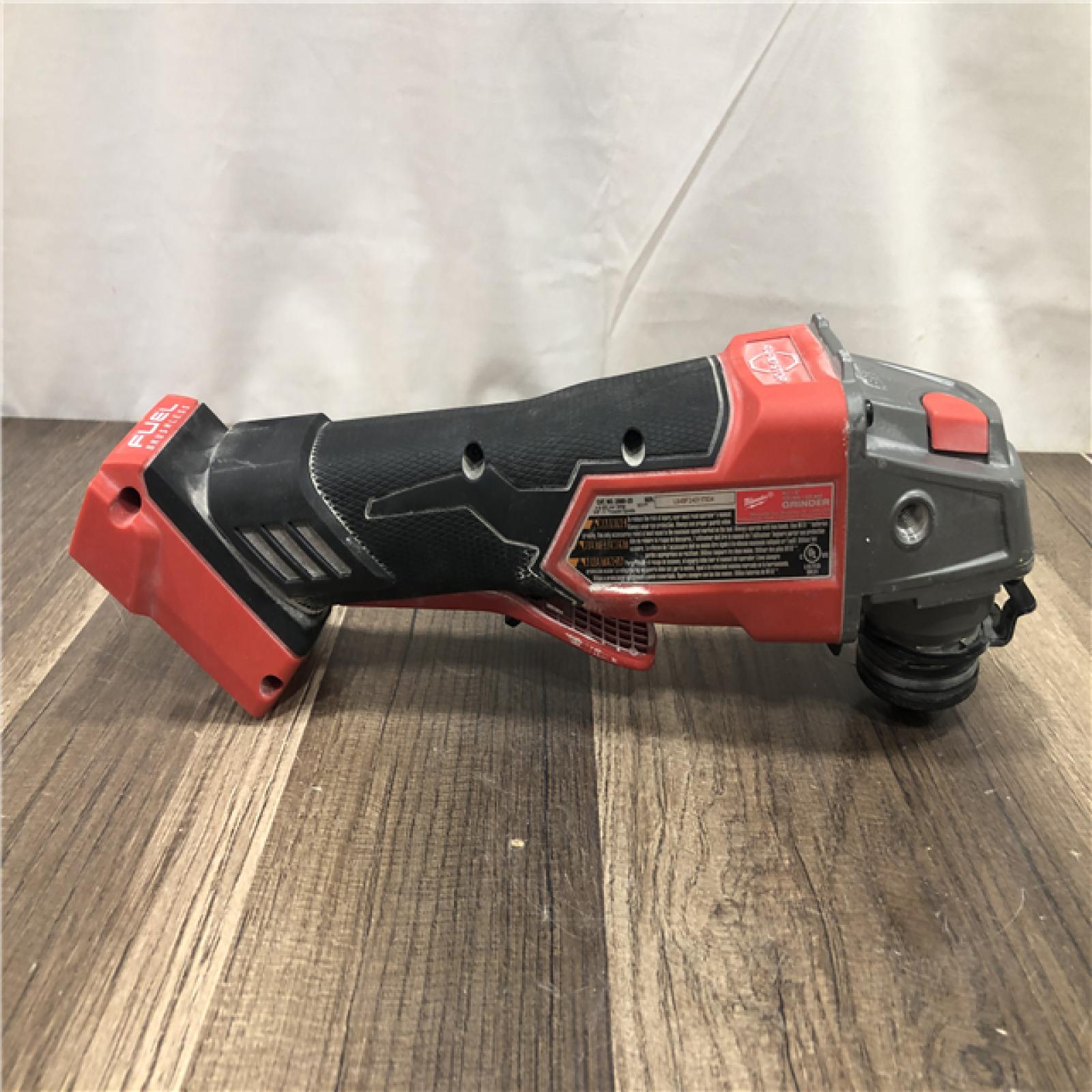 AS-IS Milwaukee  FUEL 18V Lithium-Ion Brushless Cordless 4-1/2 in./5 in. Grinder w/Paddle Switch (Tool-Only)