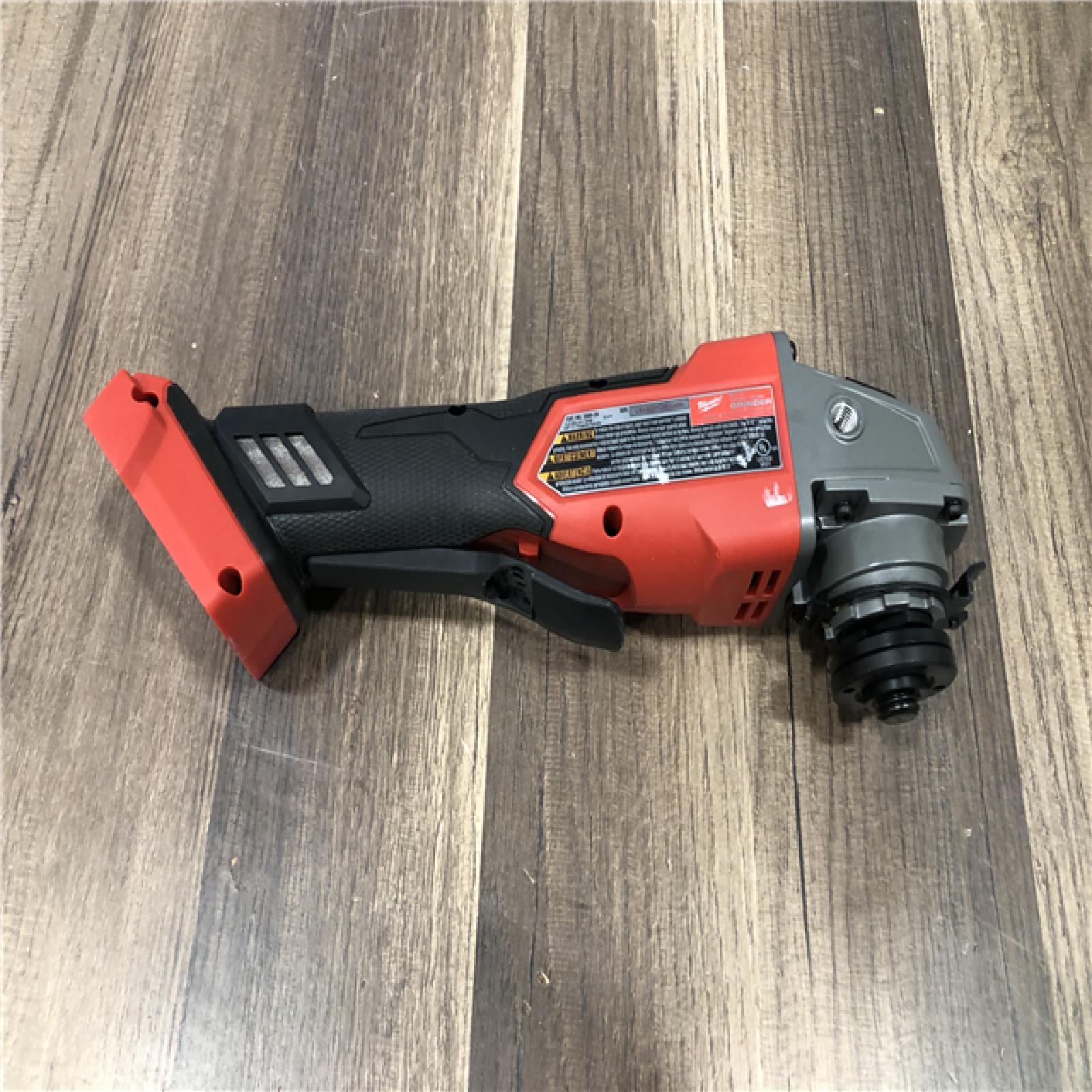 AS-IS Milwaukee  FUEL 18V Lithium-Ion Brushless Cordless 4-1/2 in./5 in. Grinder w/Paddle Switch (Tool-Only)
